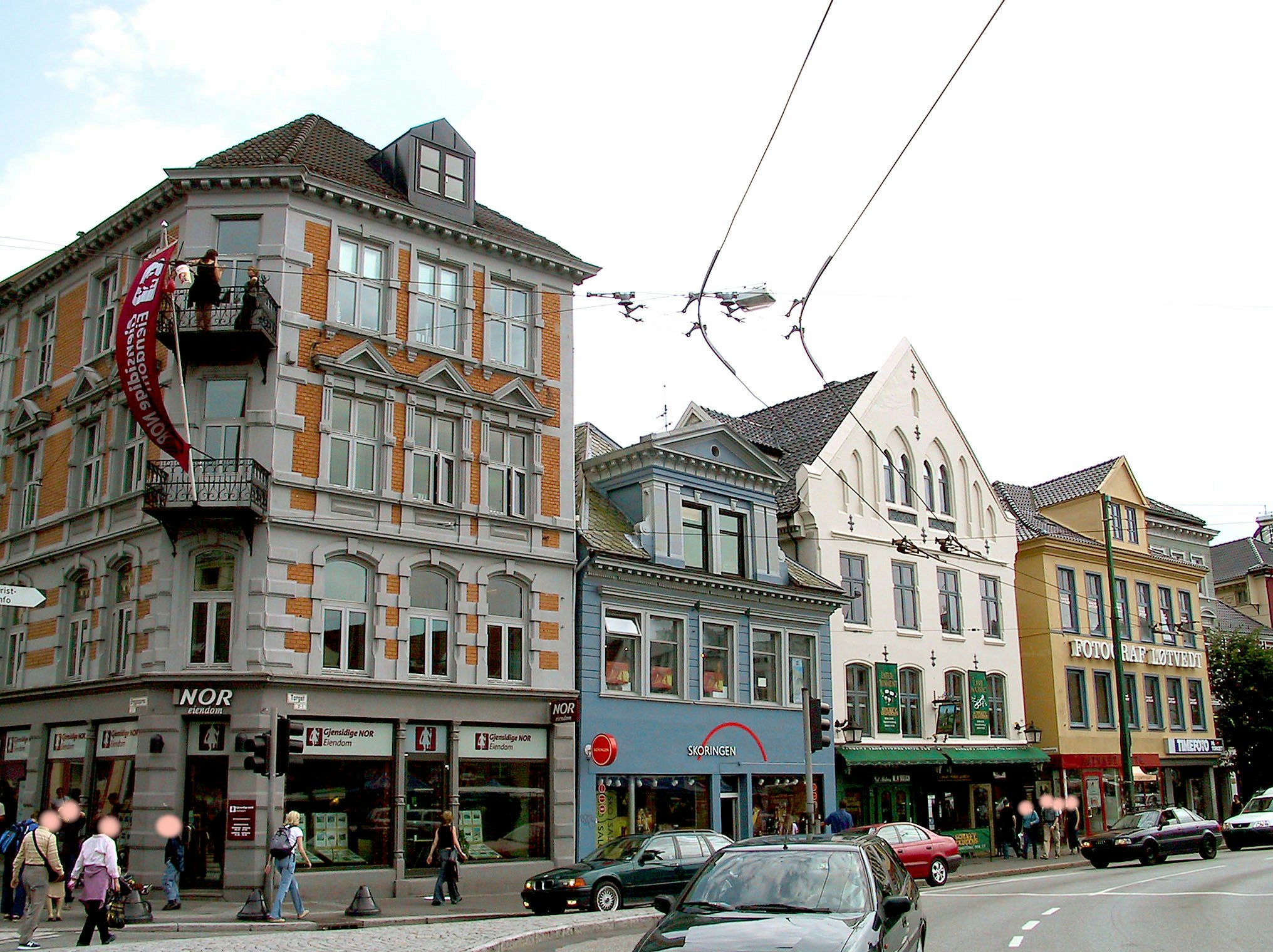 colorful storefront buildings along a street