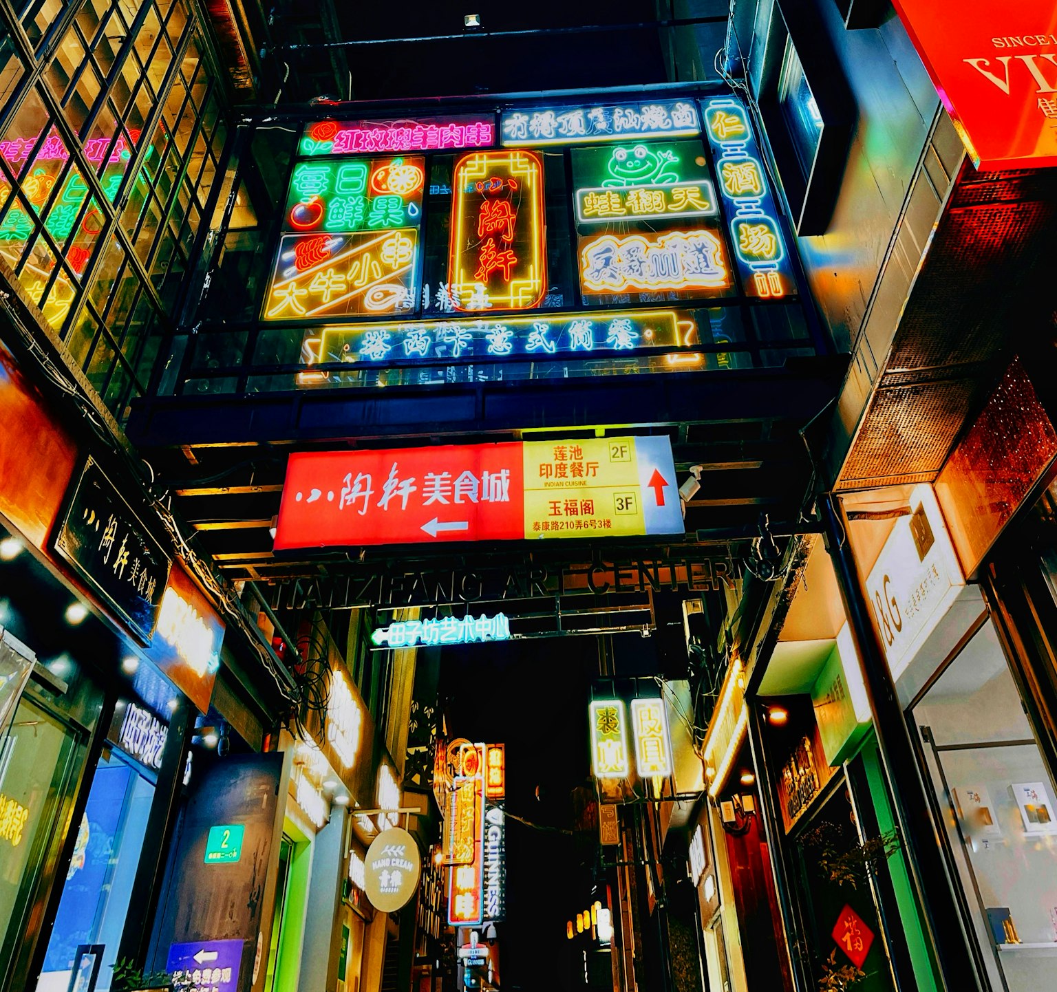 Colorful signs lining a night market street