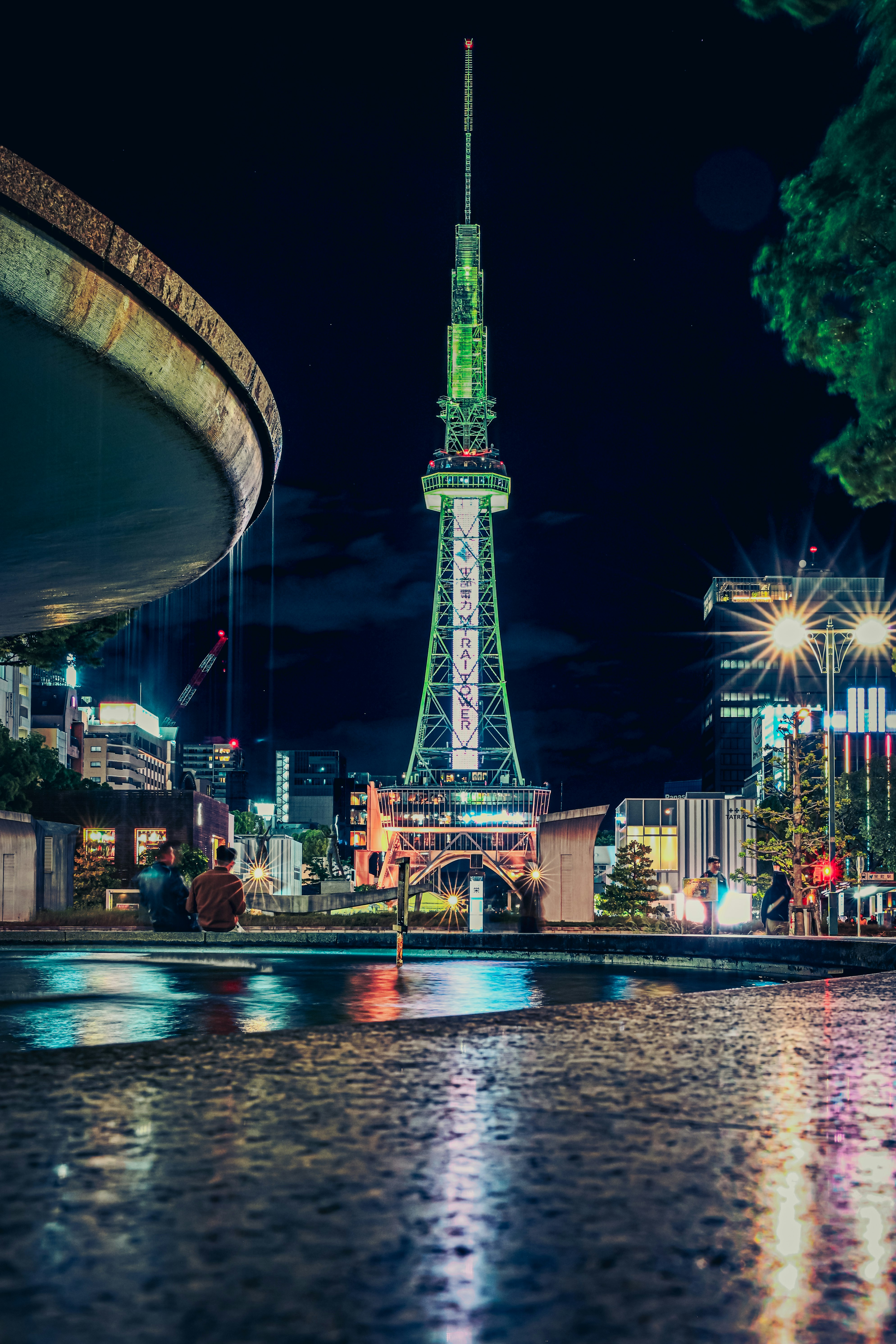 Nagoya night skyline with a TV tower and riverside lights