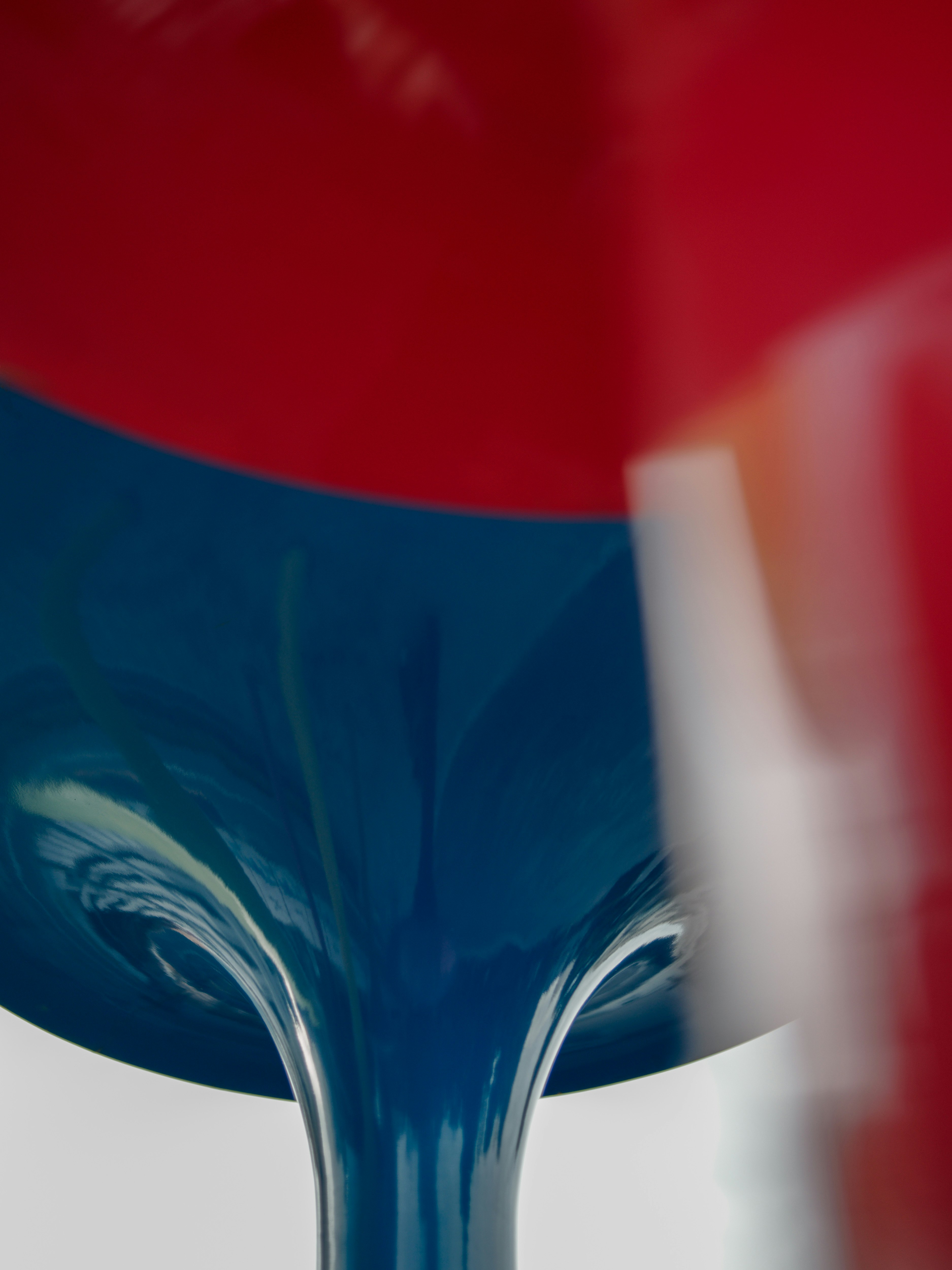 abstract liquid stream with blue fluid flowing downward