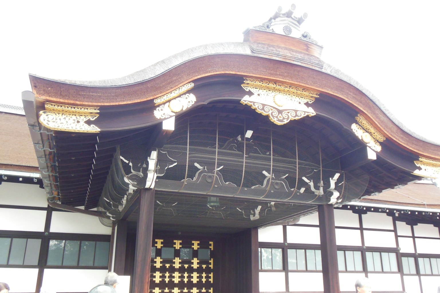 Traditional Japanese architecture with ornate roof and entrance
