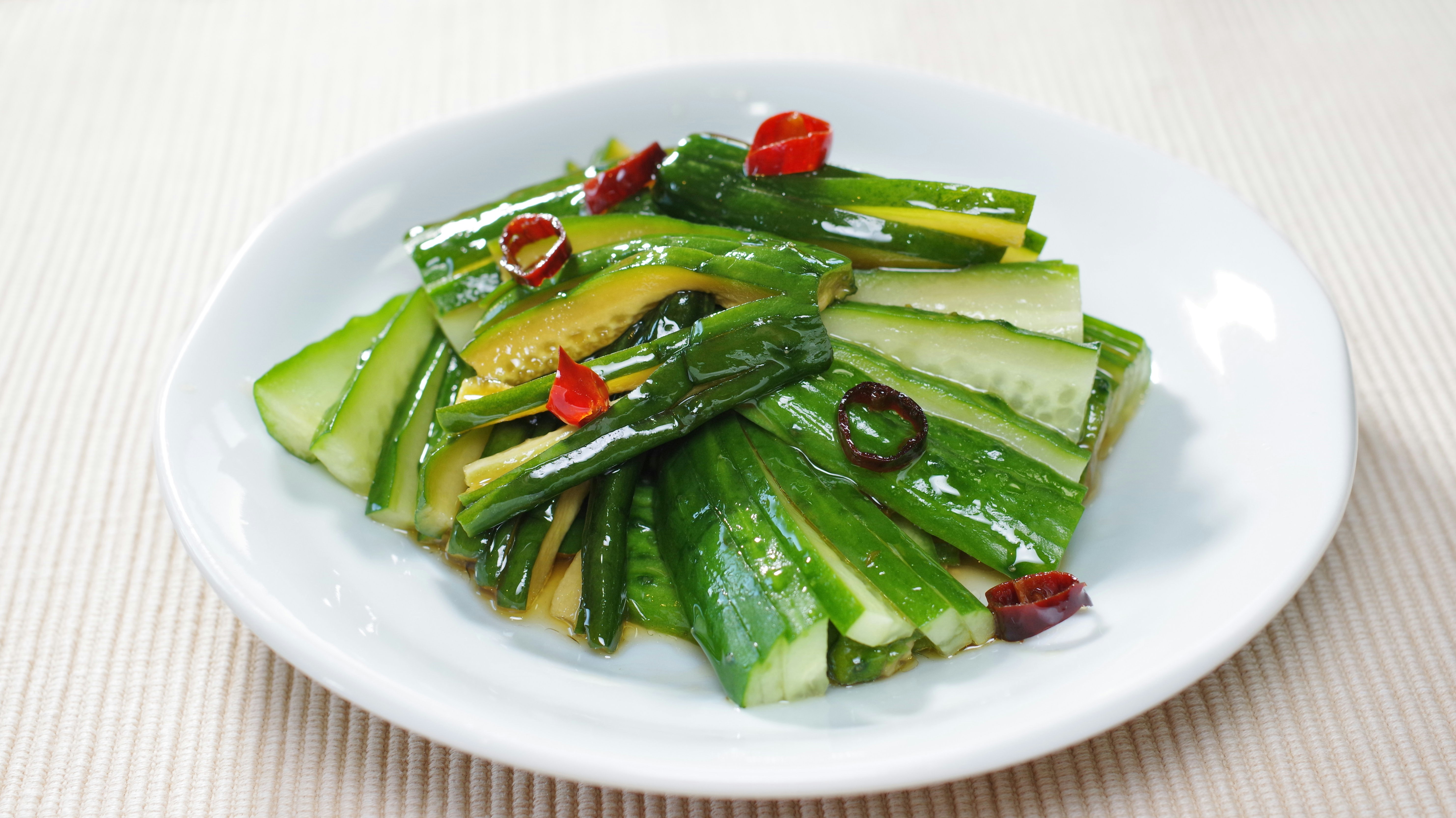cucumber and seaweed salad on a white plate