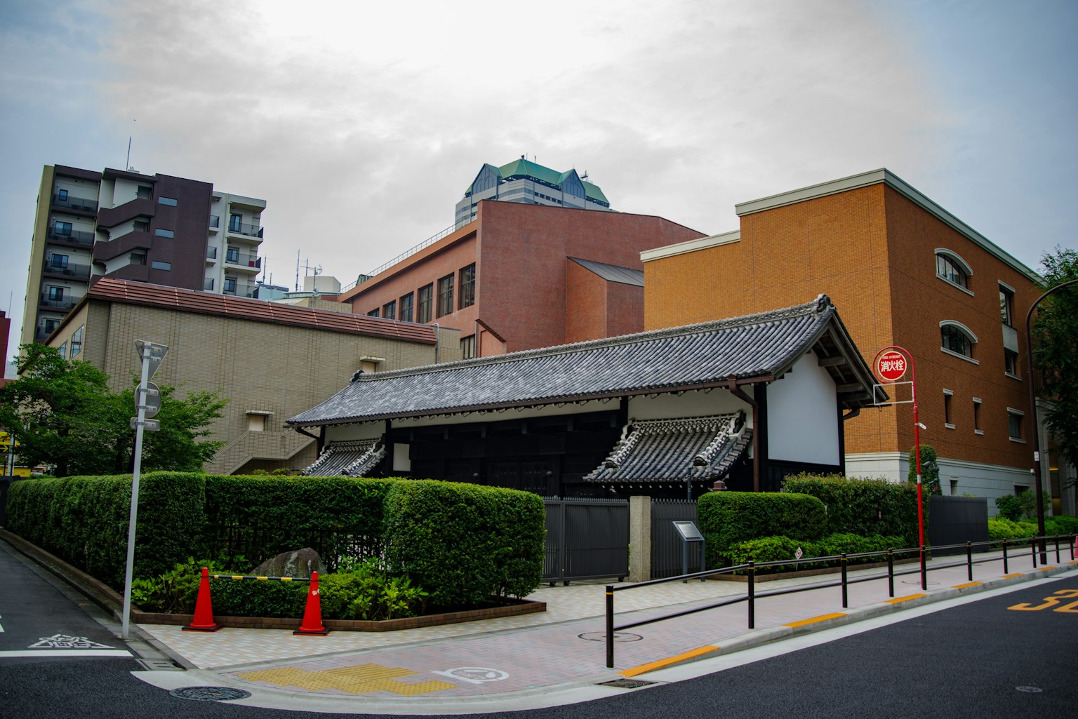 Traditional Japanese building alongside modern architecture