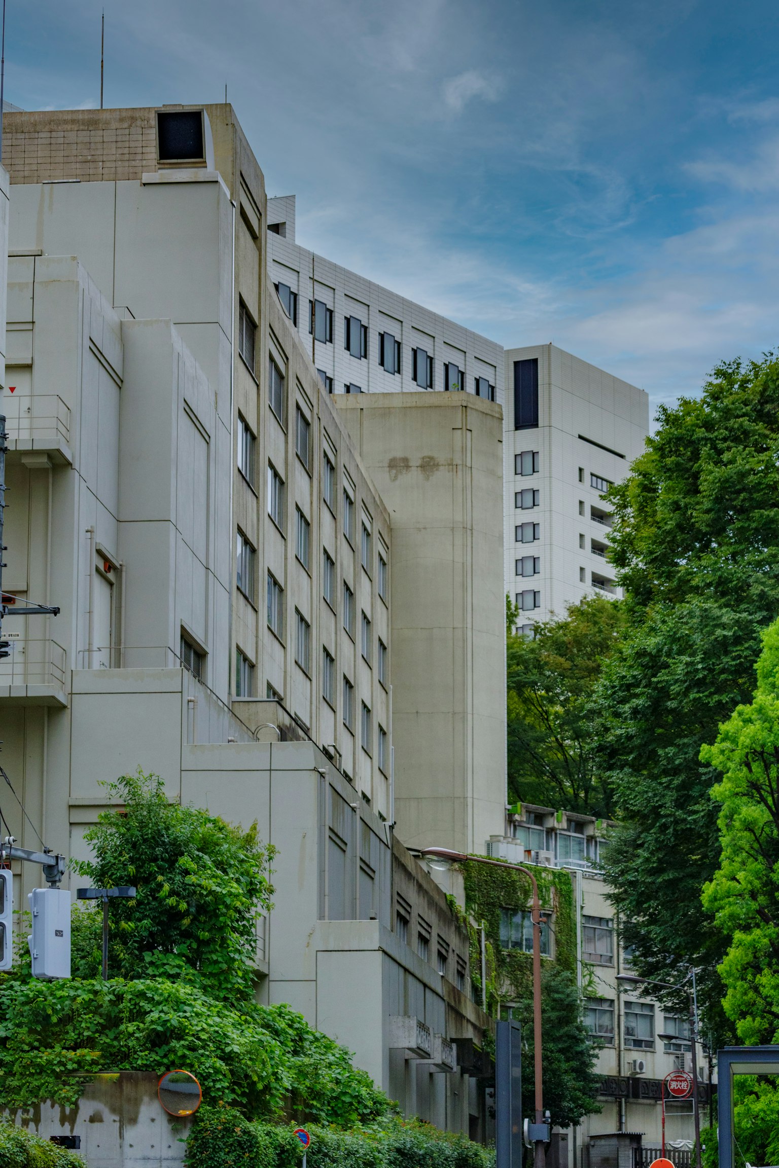 Urban landscape featuring high-rise buildings and lush greenery