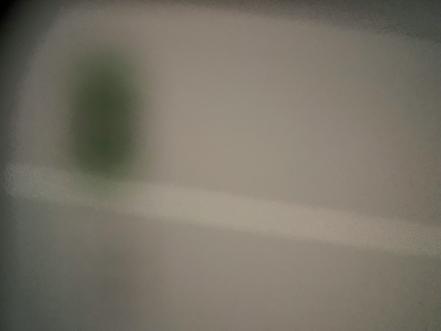 Sfondo sfocato con una forma verde