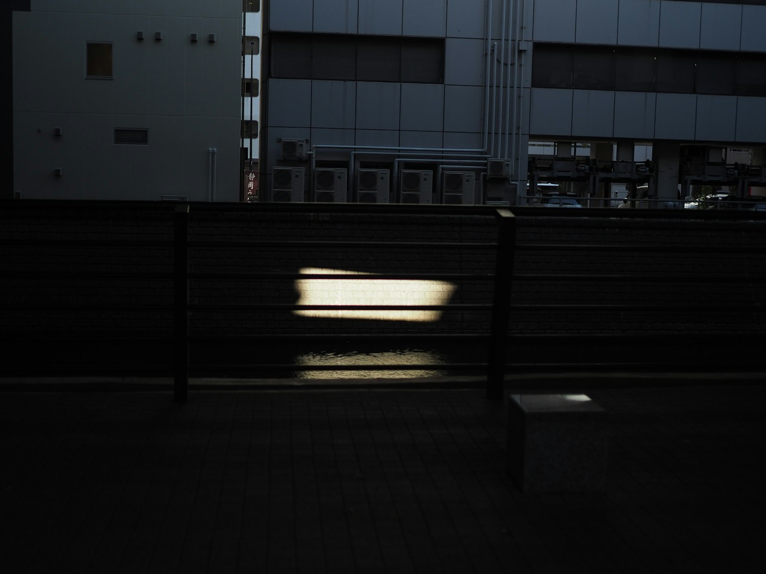 A simple landscape with bright light on a dark background