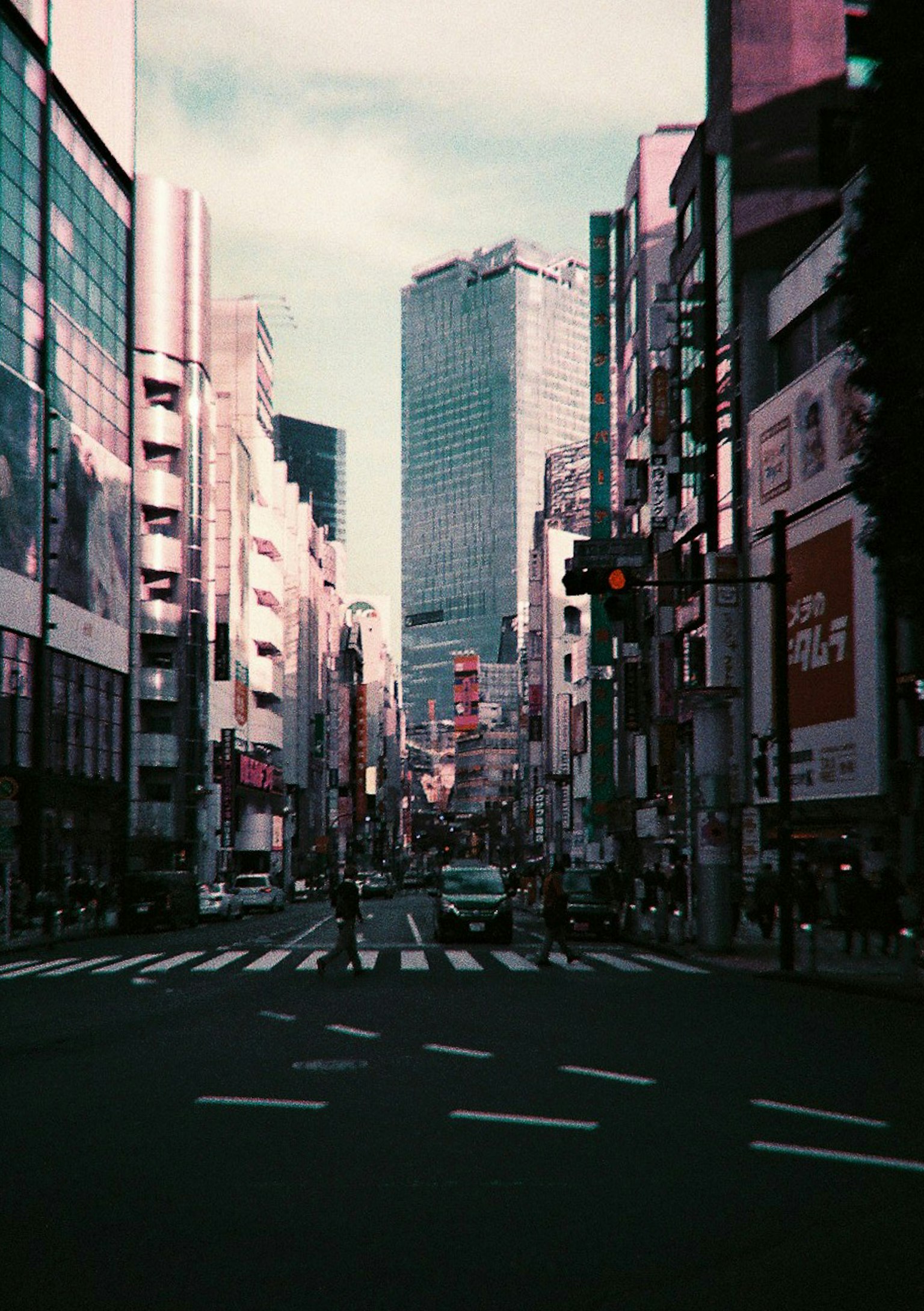 Urban intersection with skyscrapers in the background