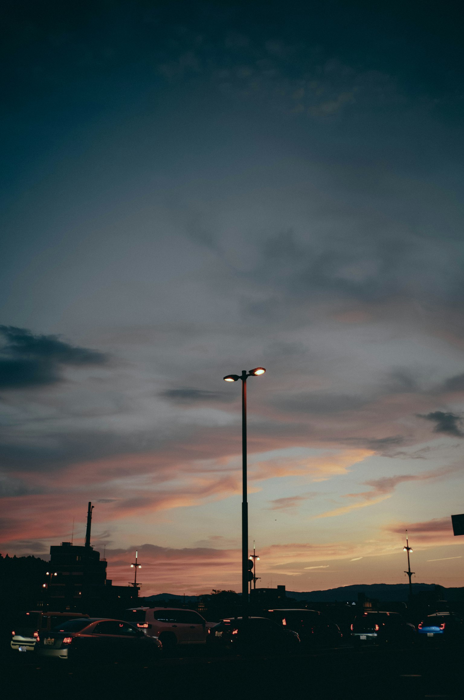 Twilight sky with a streetlight in the foreground
