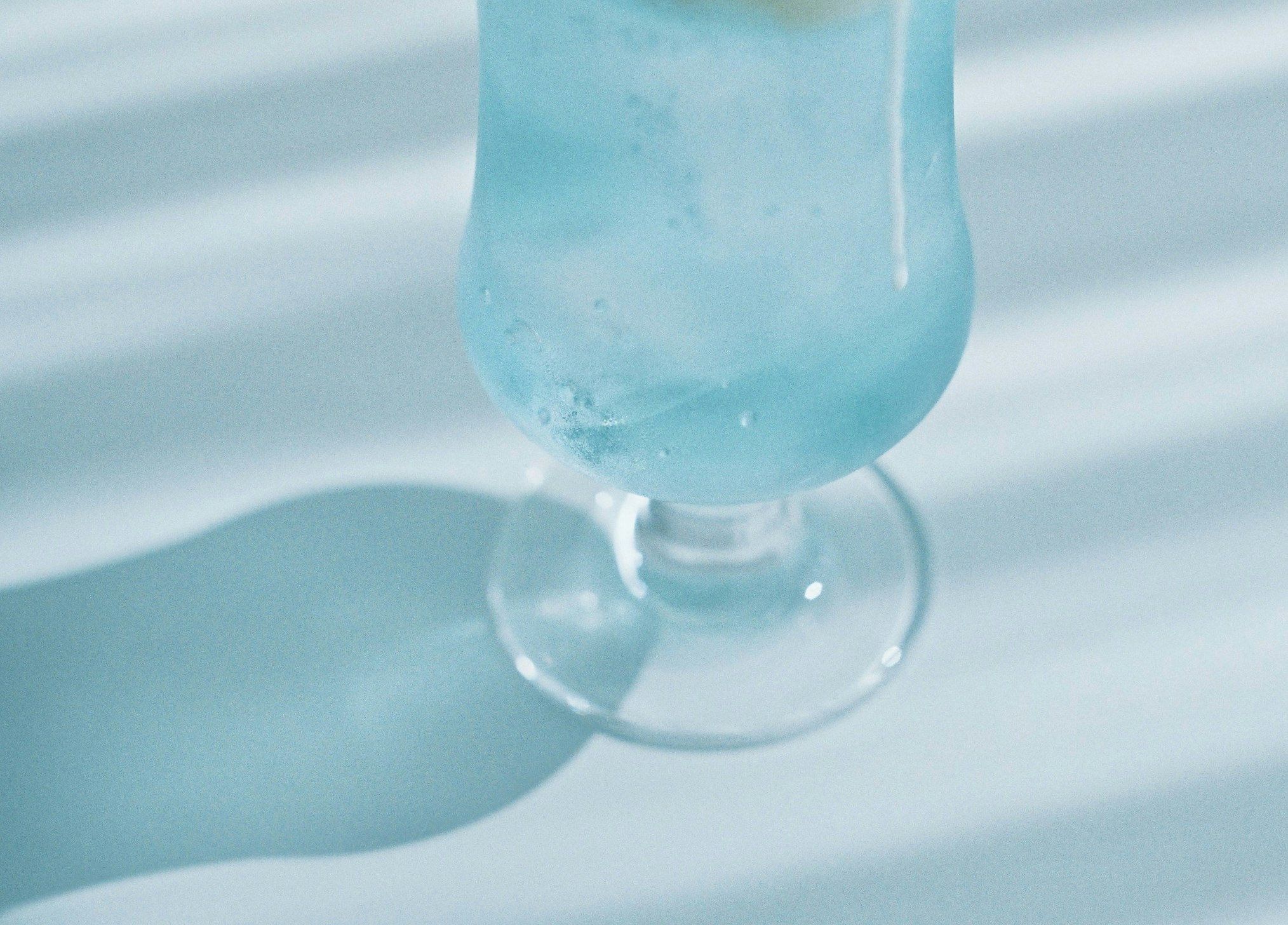 close-up of a test tube filled with blue liquid