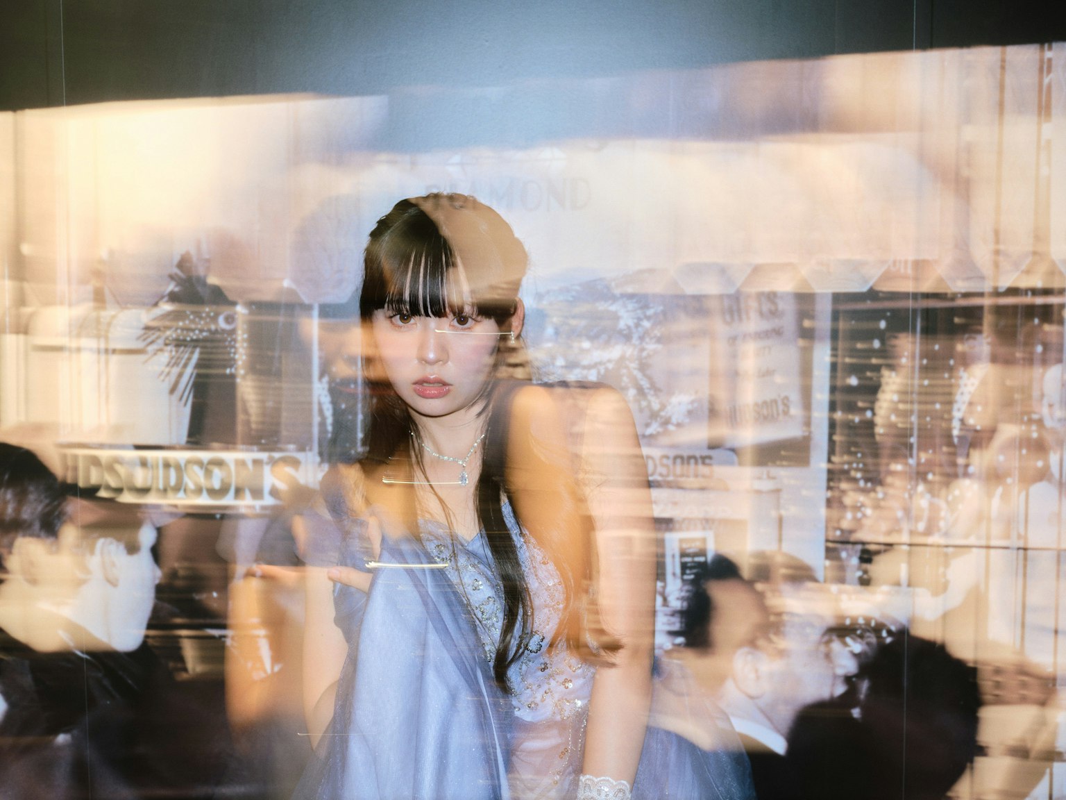 Portrait of a woman posing with a blurred background