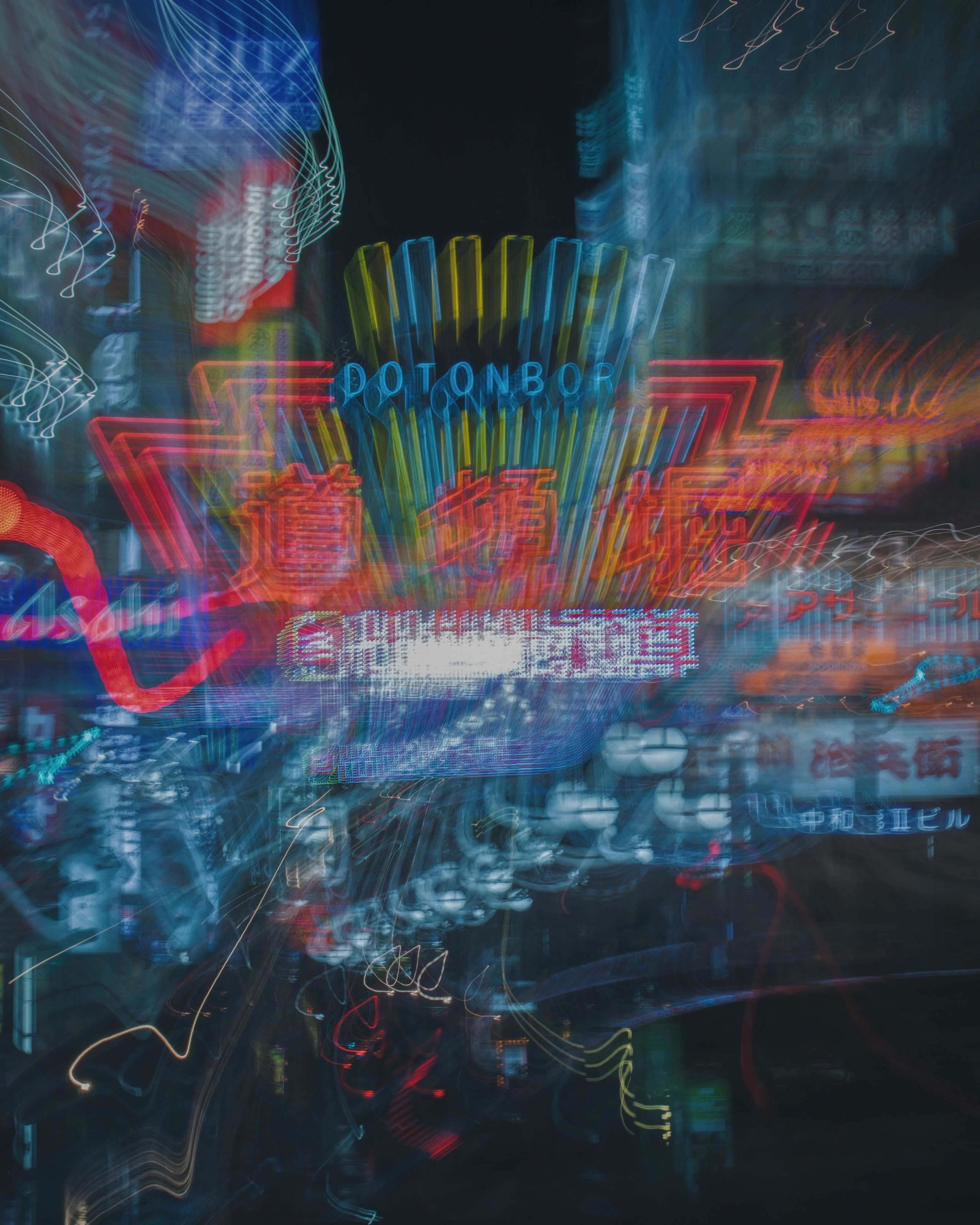 Neon text and circuit-like light overlay in a nighttime city scene