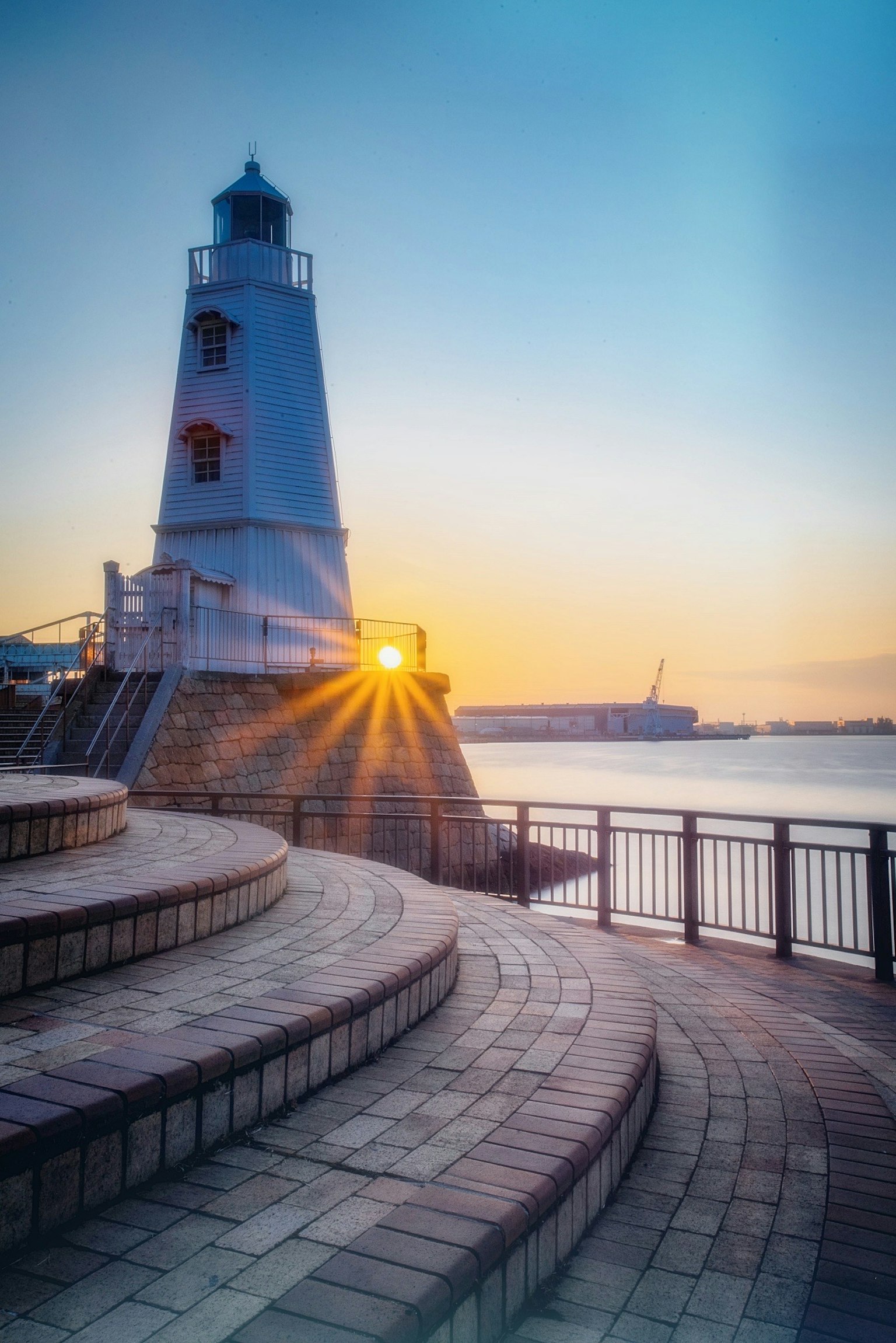 Beautiful view of a lighthouse with the sunset in the background