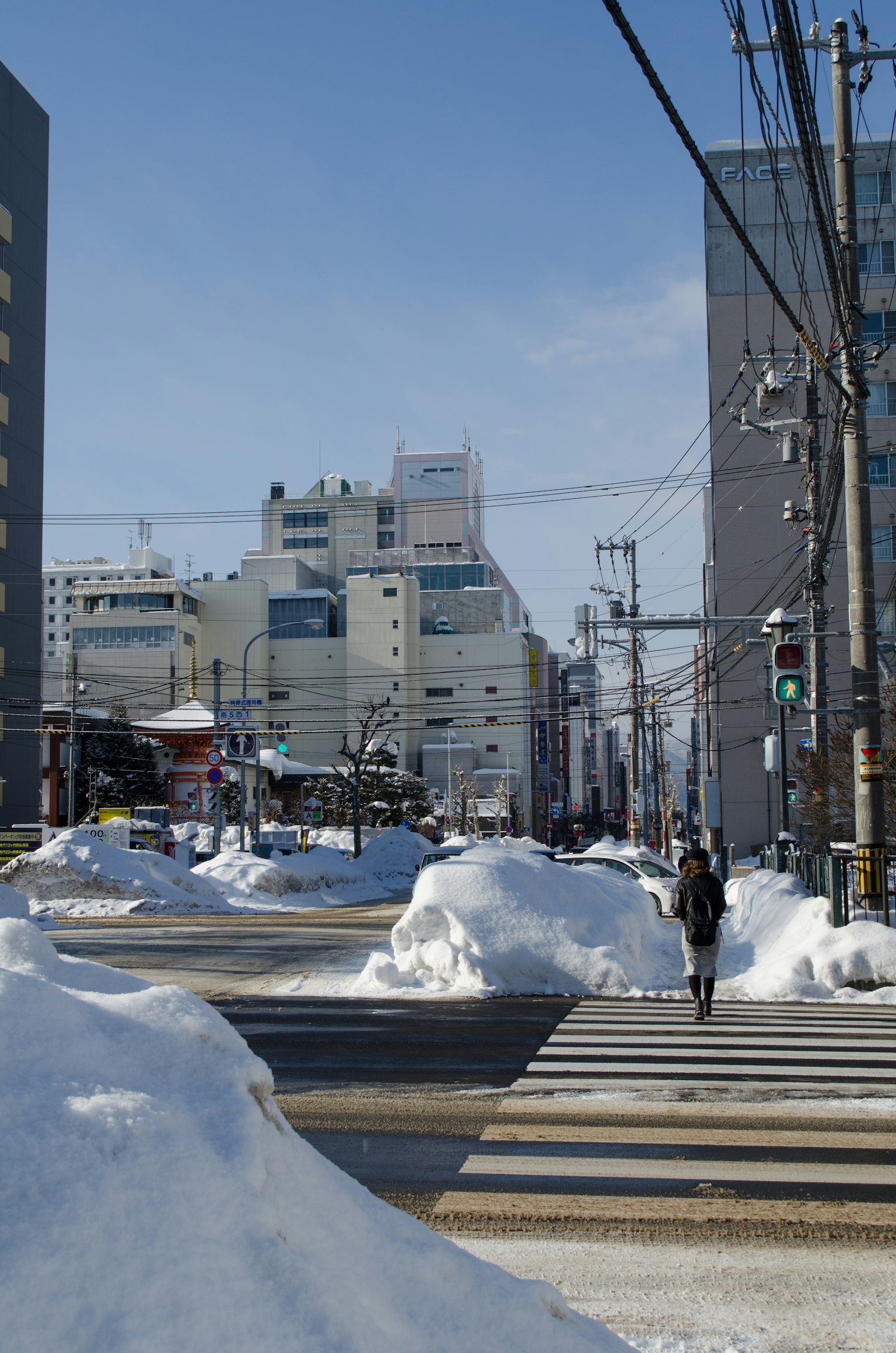 Snow-covered intersection and urban landscape