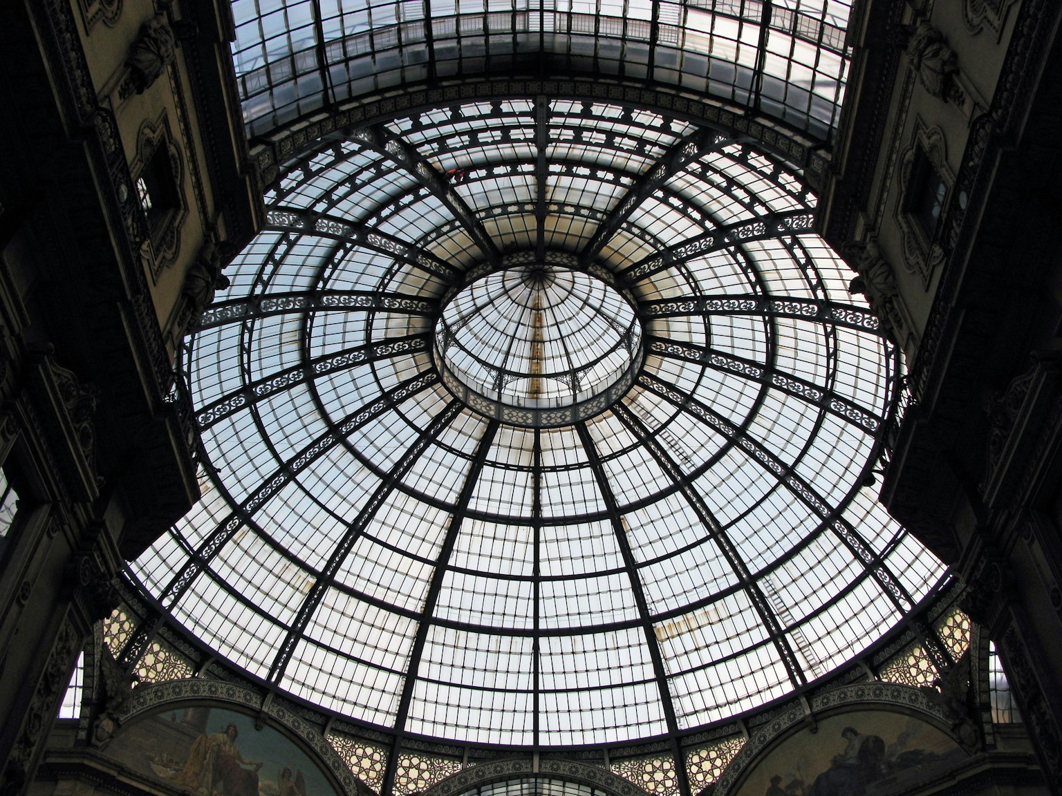 View of a beautiful dome-shaped glass ceiling from below