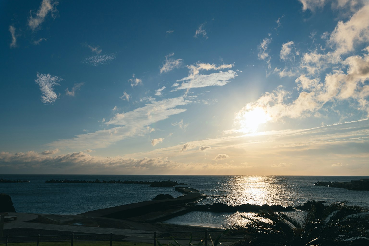 A beautiful seascape with a shining sunset over the ocean