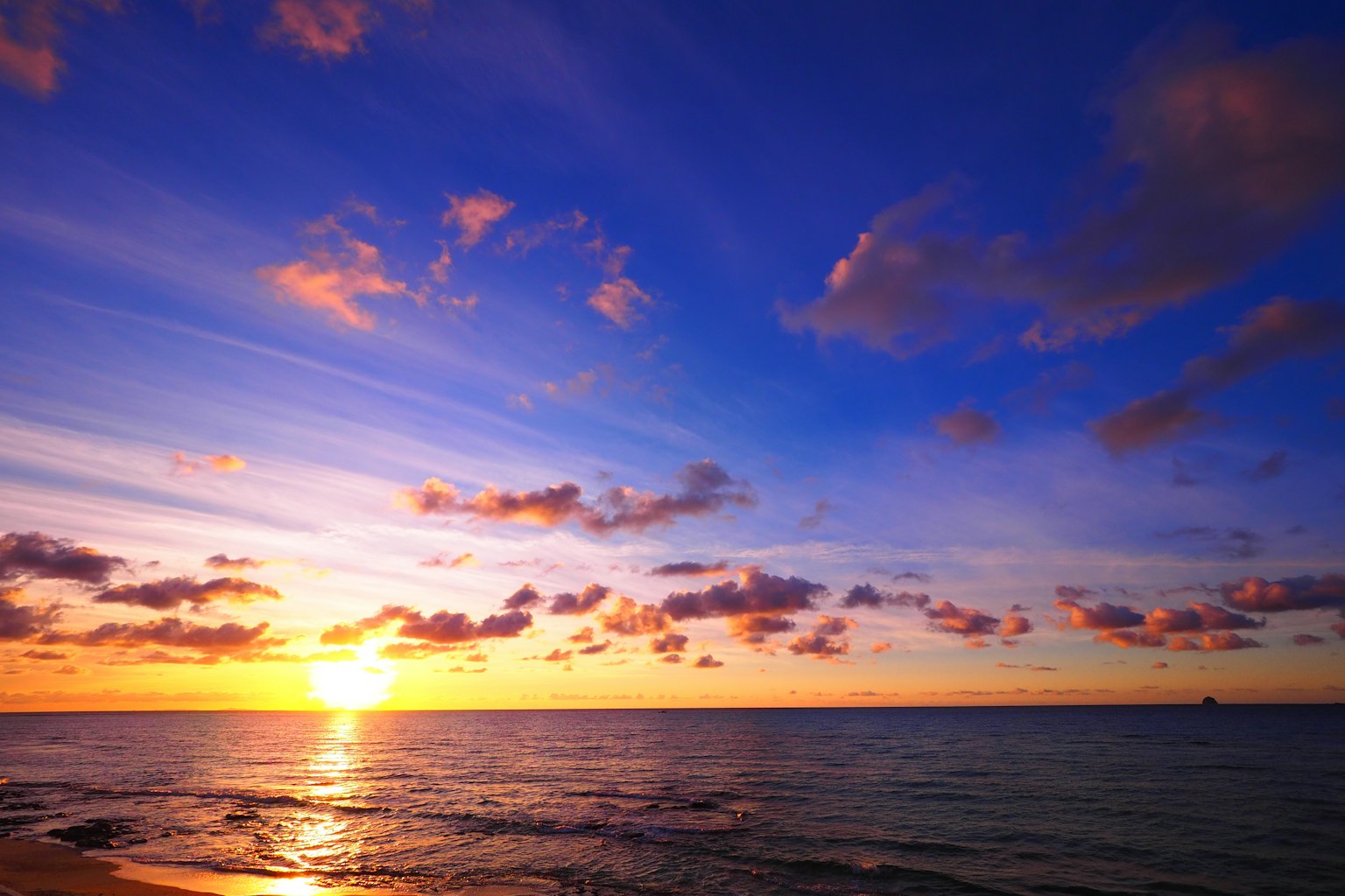 Beautiful sunset over the ocean with vibrant sky colors