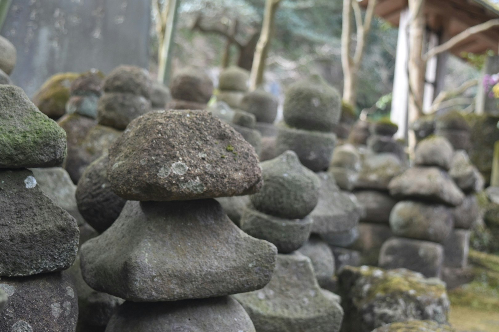 stacked stone cairns in a row