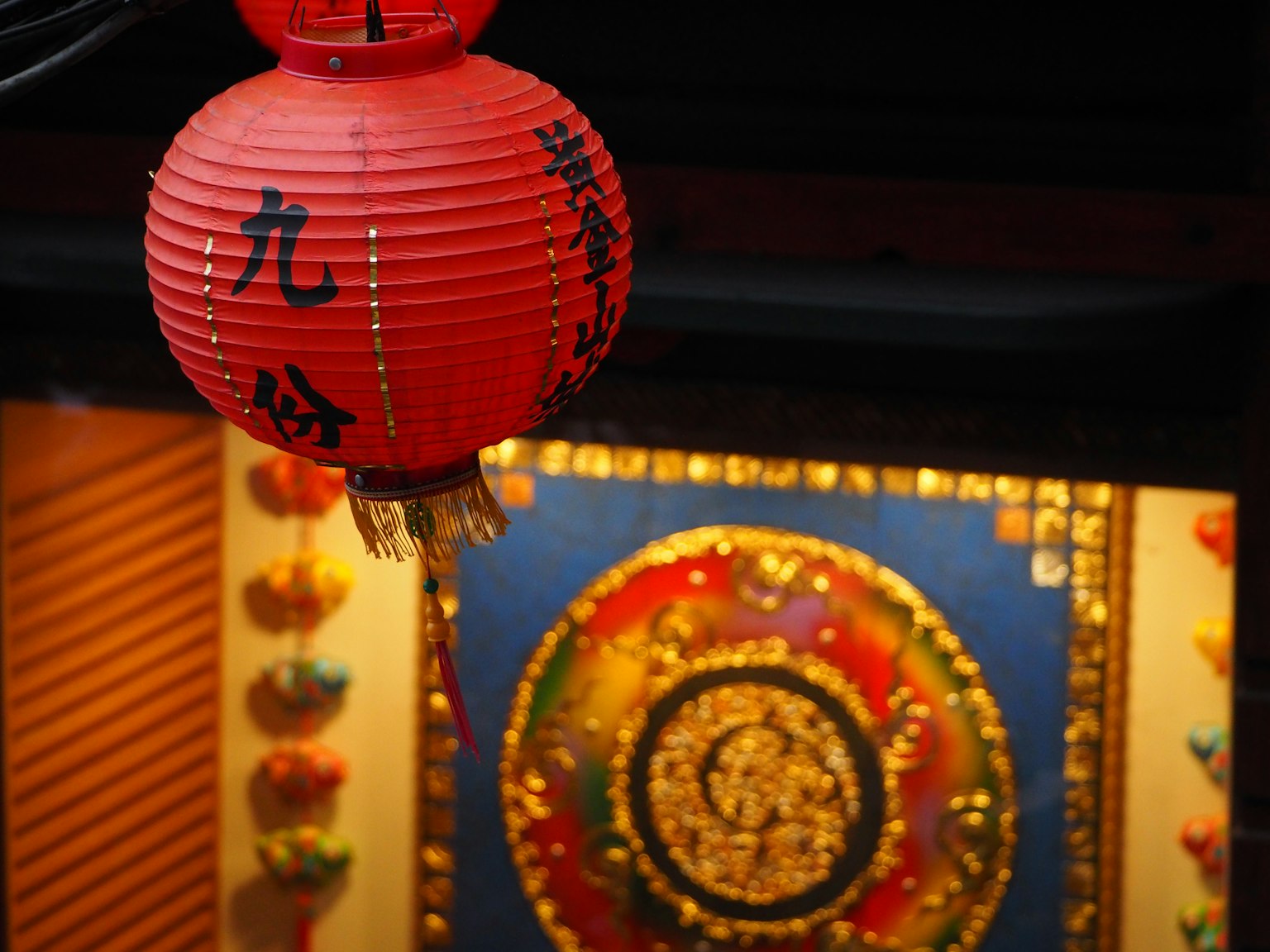 Red lantern with decorative background featuring vibrant colors