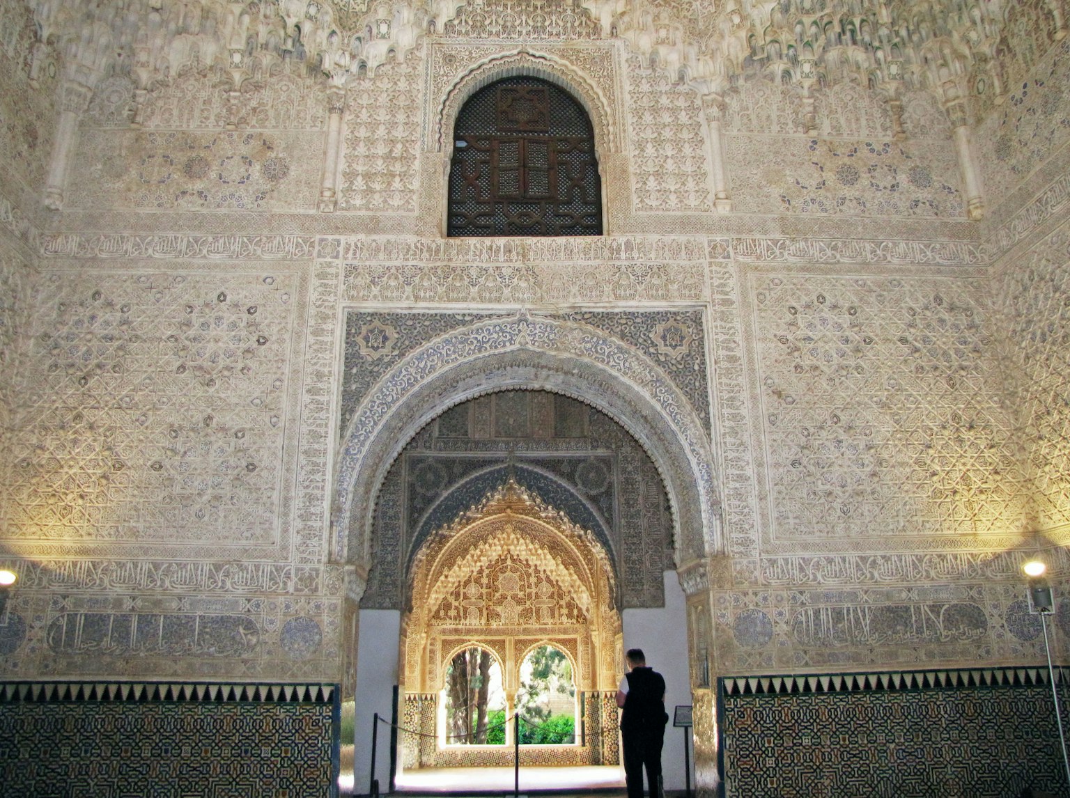 Interior of a room featuring intricate wall decorations and arches