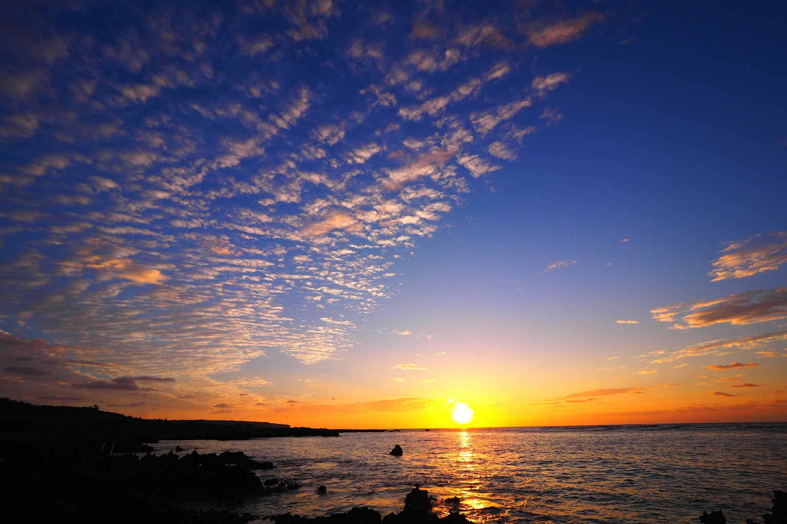 Beautiful sunset with a blue sky and scattered clouds