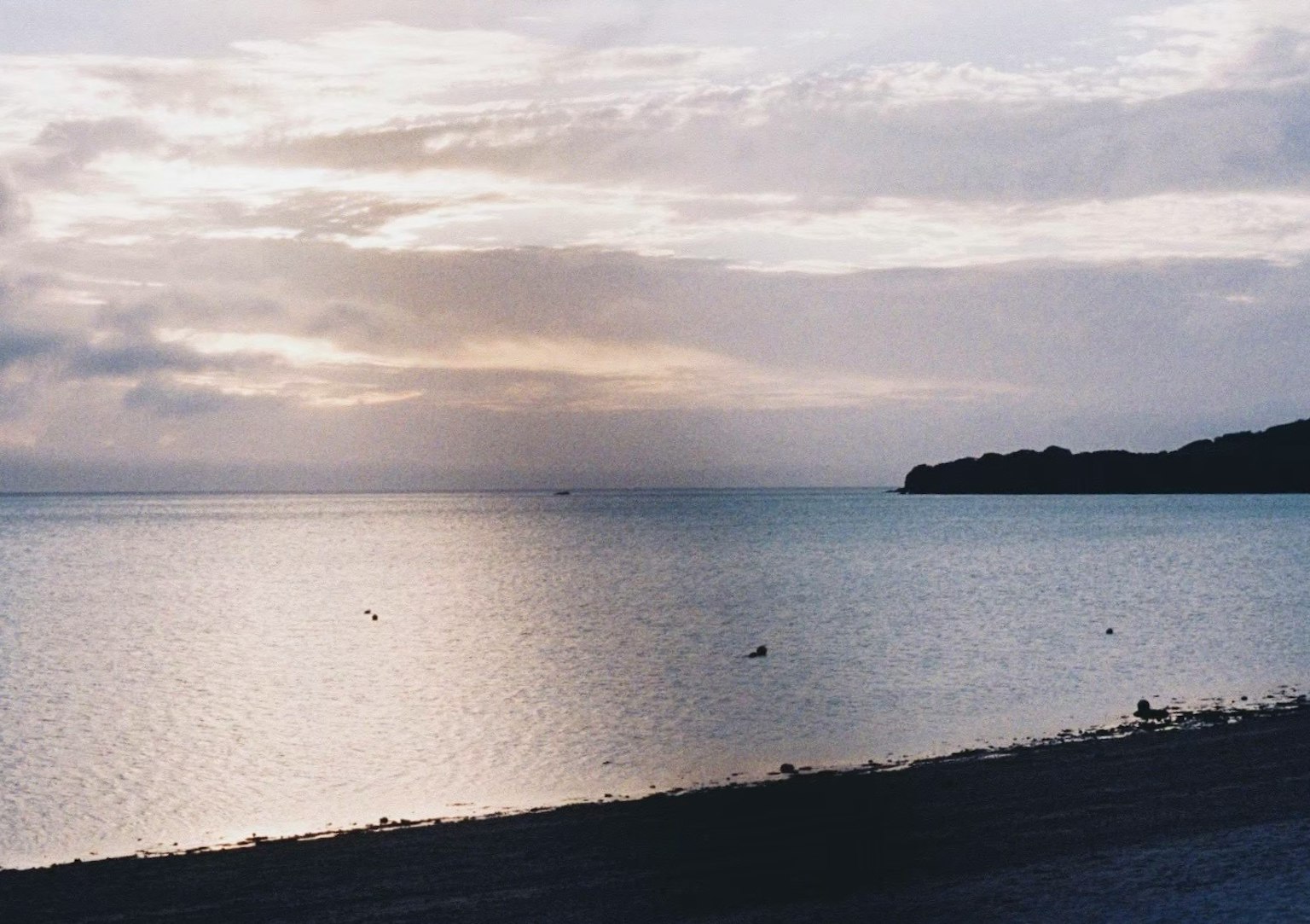 Calm sea and cloudy sky landscape Soft light reflecting on the water