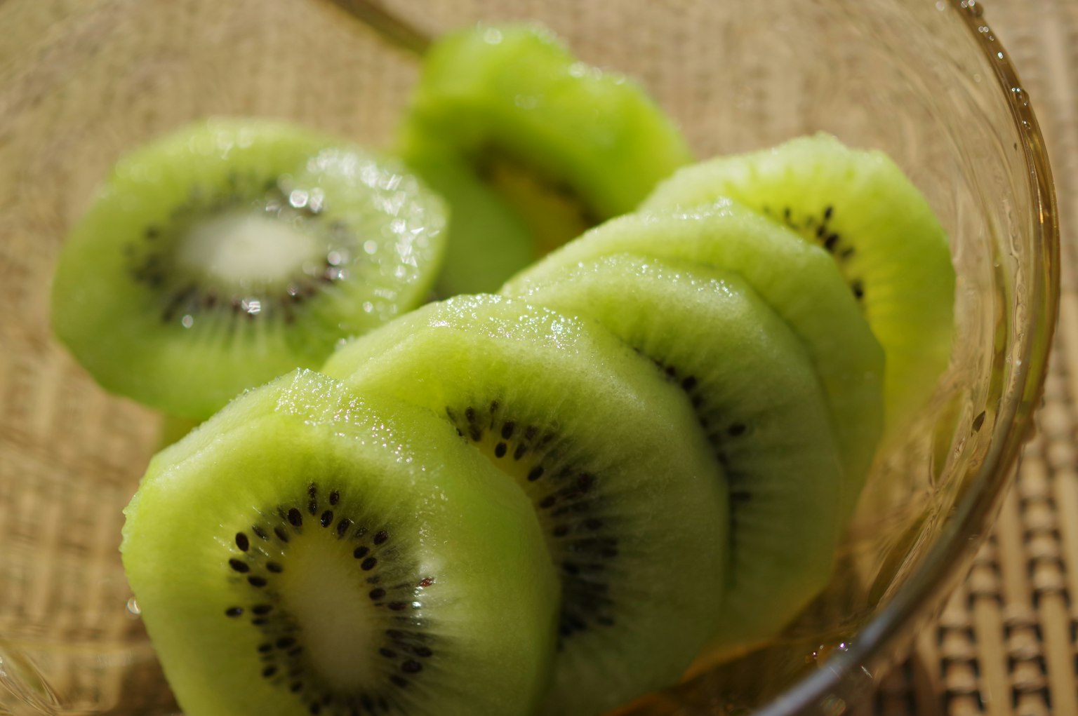 Sliced kiwi arranged in a bowl