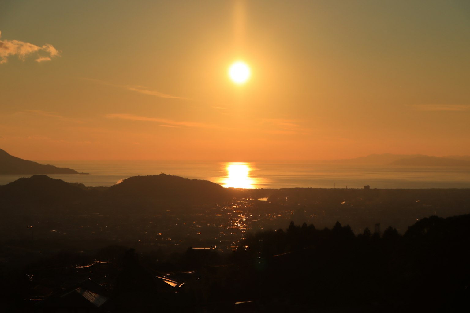 Beautiful landscape with sunset reflecting on the sea