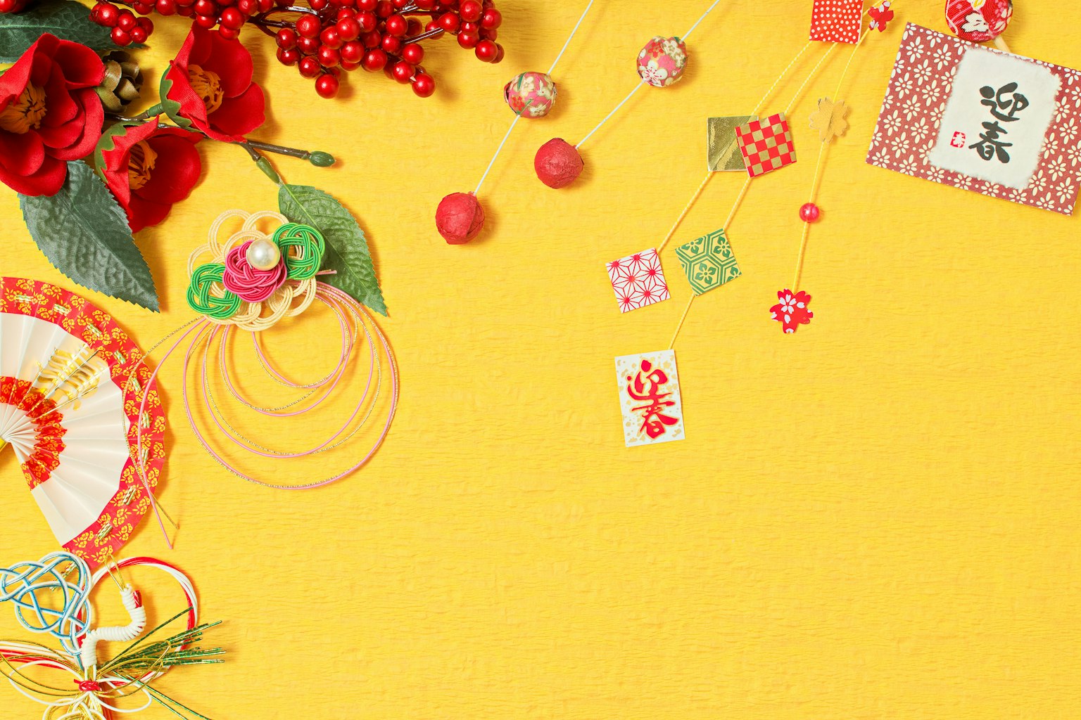 Image featuring red flowers and decorative items on a yellow background