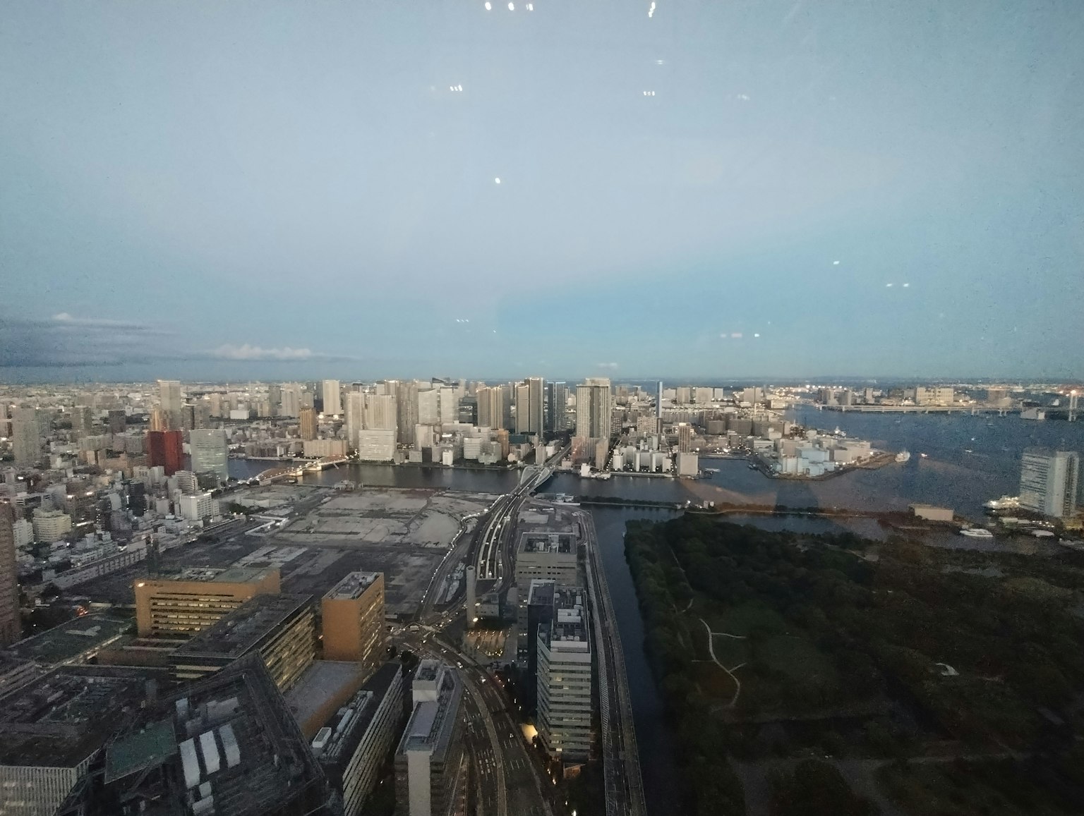 Panoramic view of a city skyline from a high-rise building