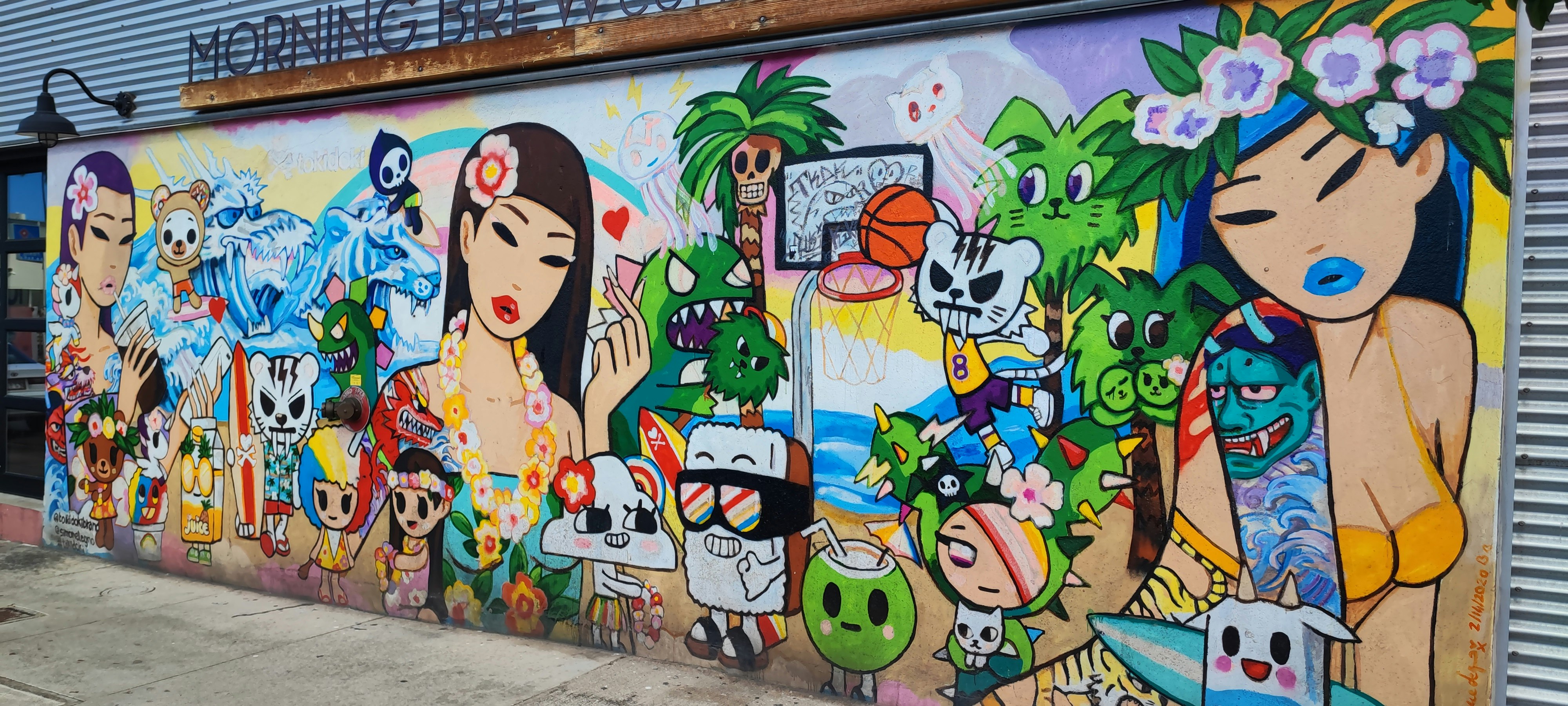 colorful character mural on a wall