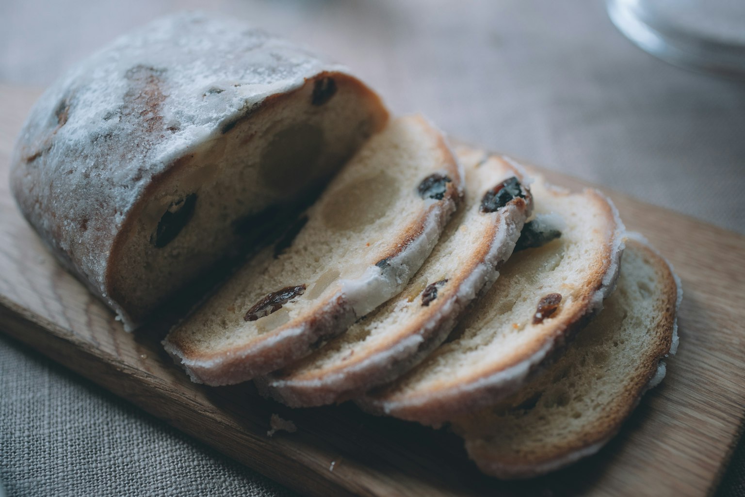 Sliced loaf of bread with visible raisins