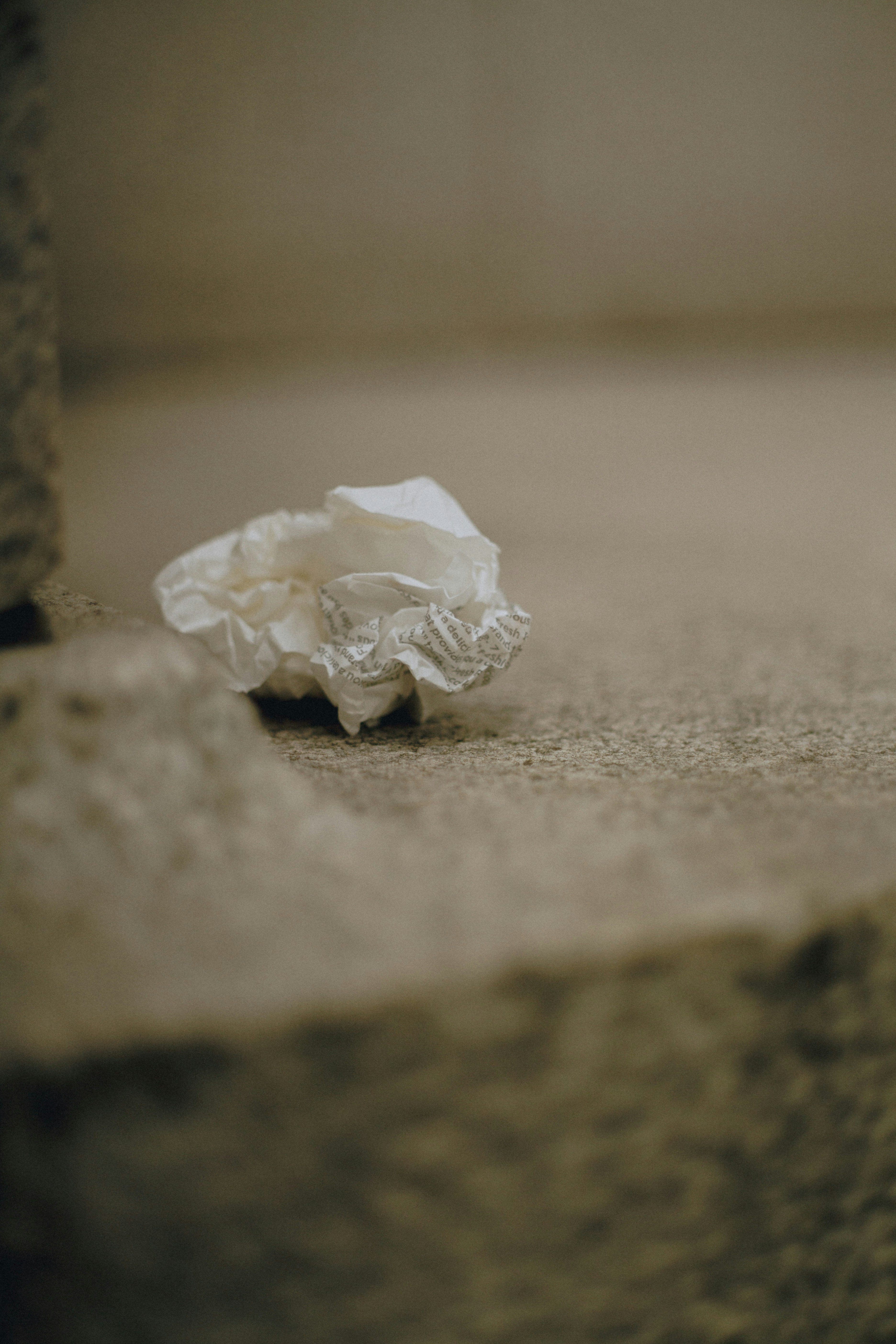 tissue and paper scraps on a bed