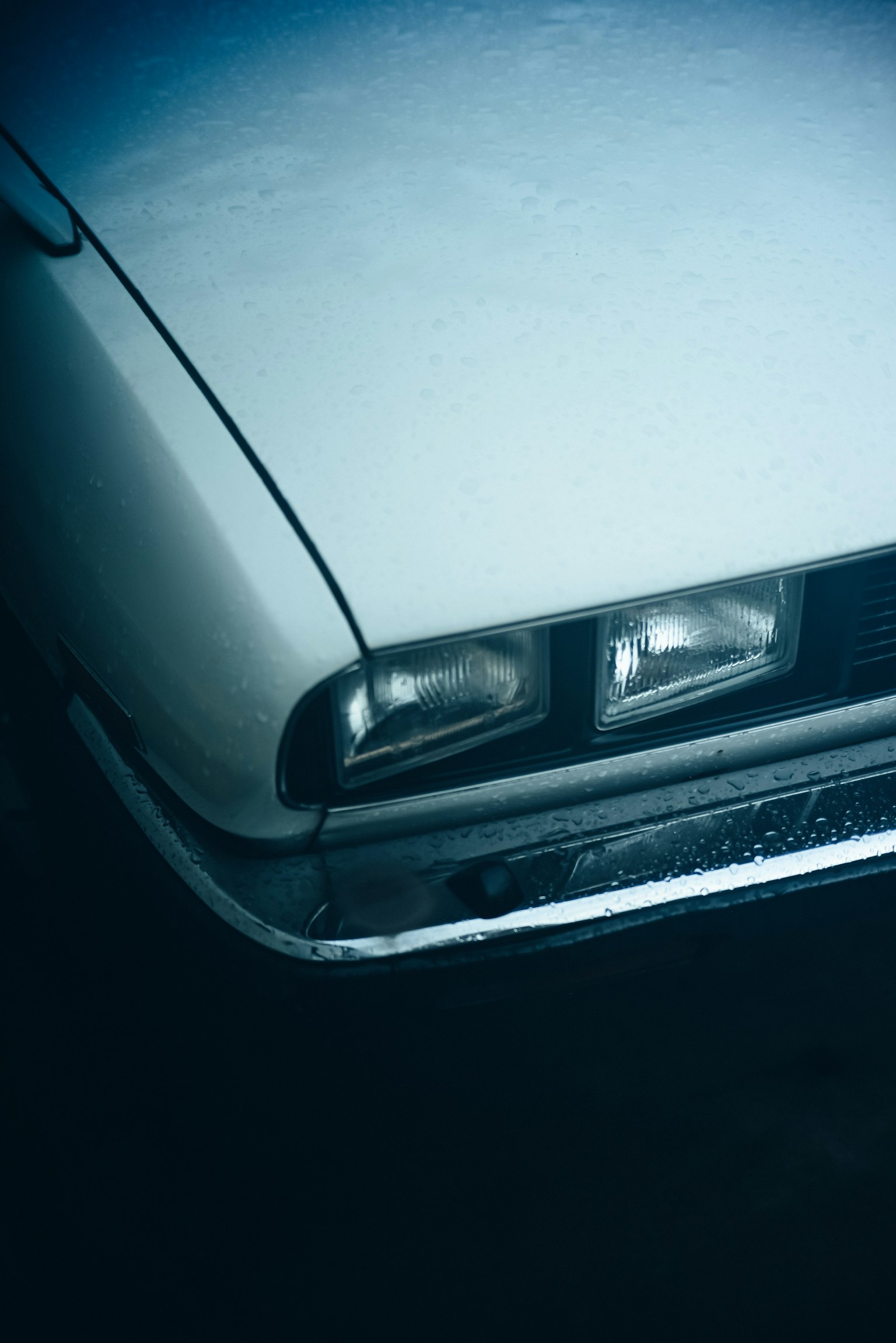 Close-up image of a car's front featuring bright colors and unique design