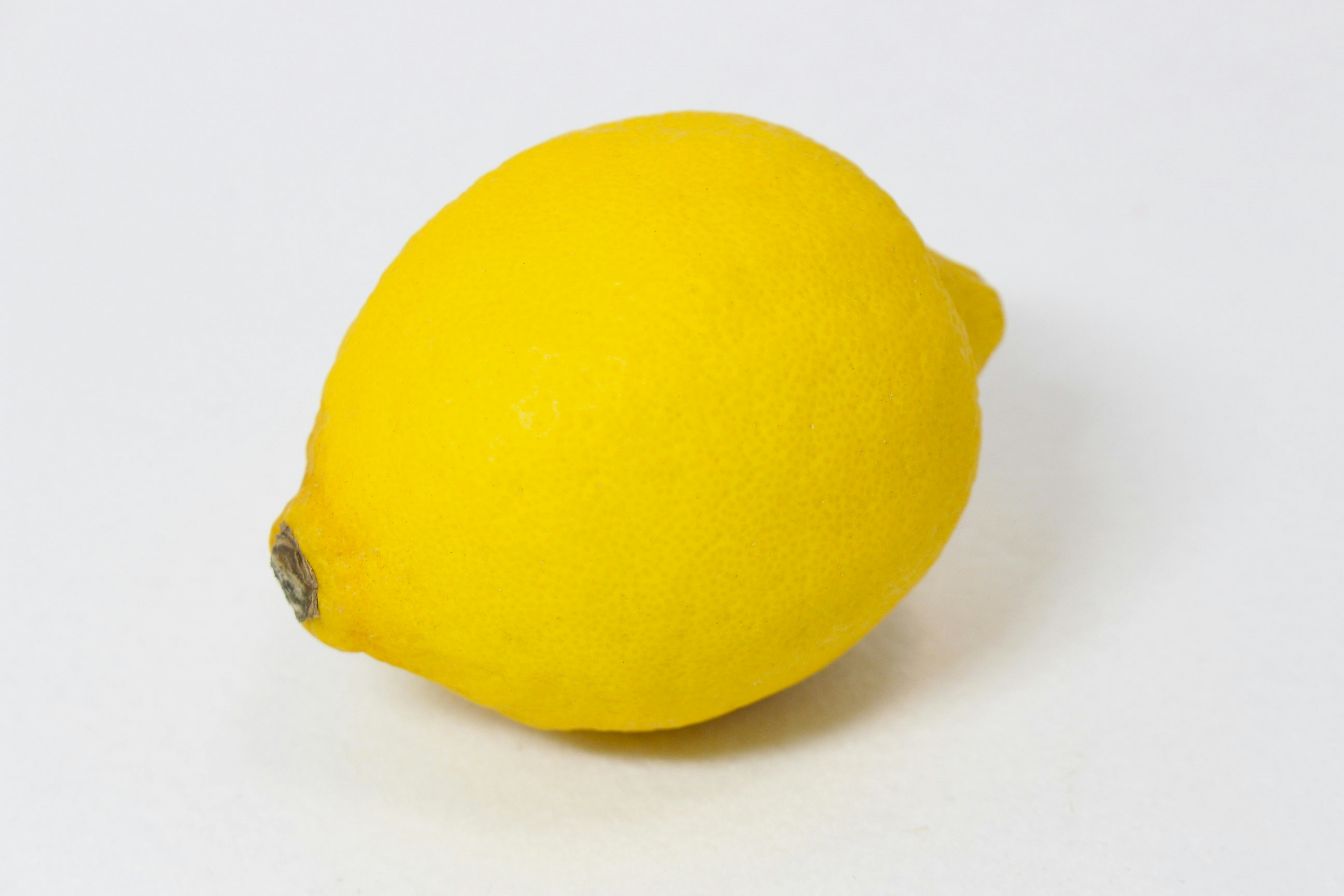 yellow lemon on a white background