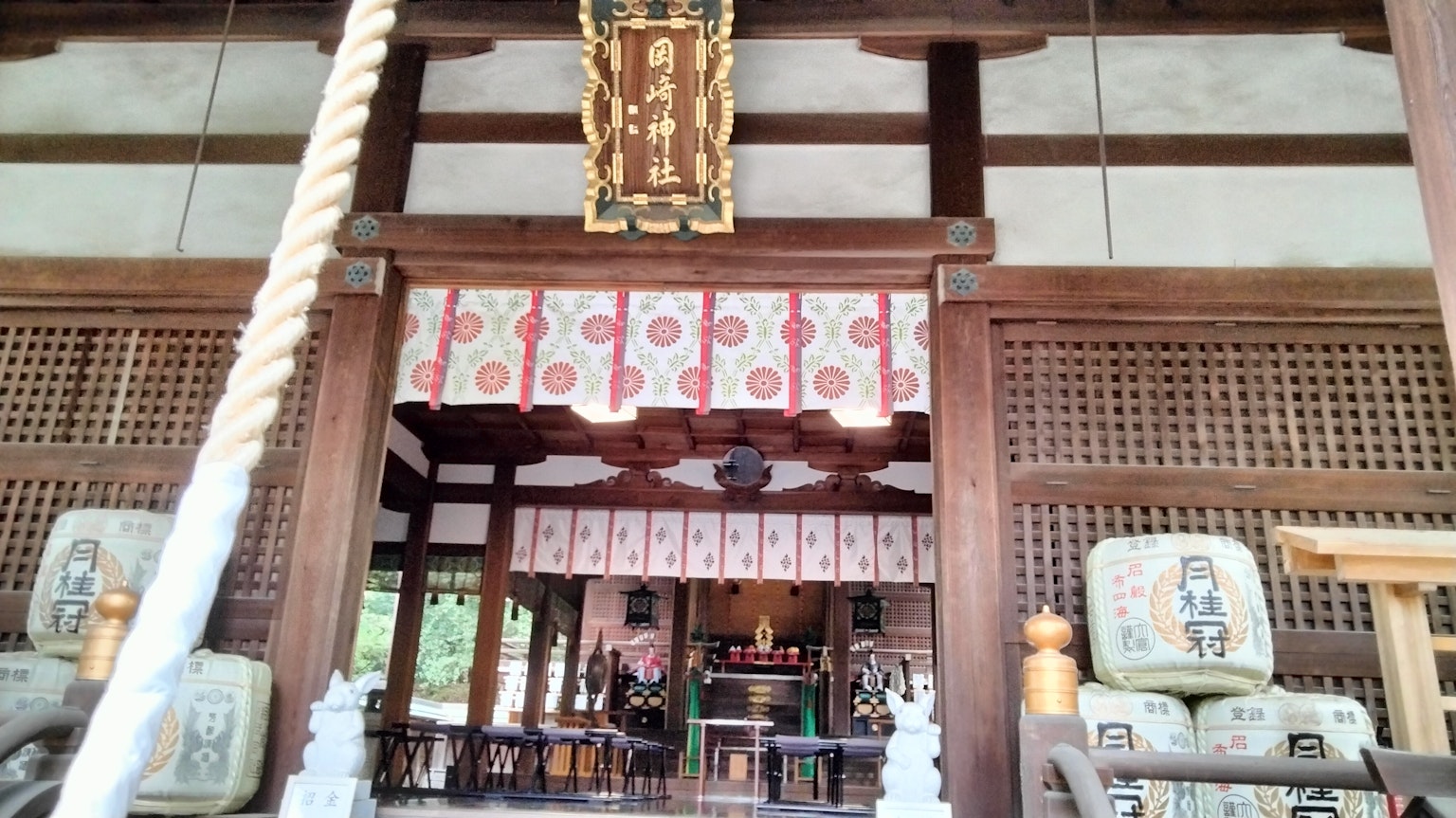 Traditional Japanese shrine interior entrance with wooden architecture