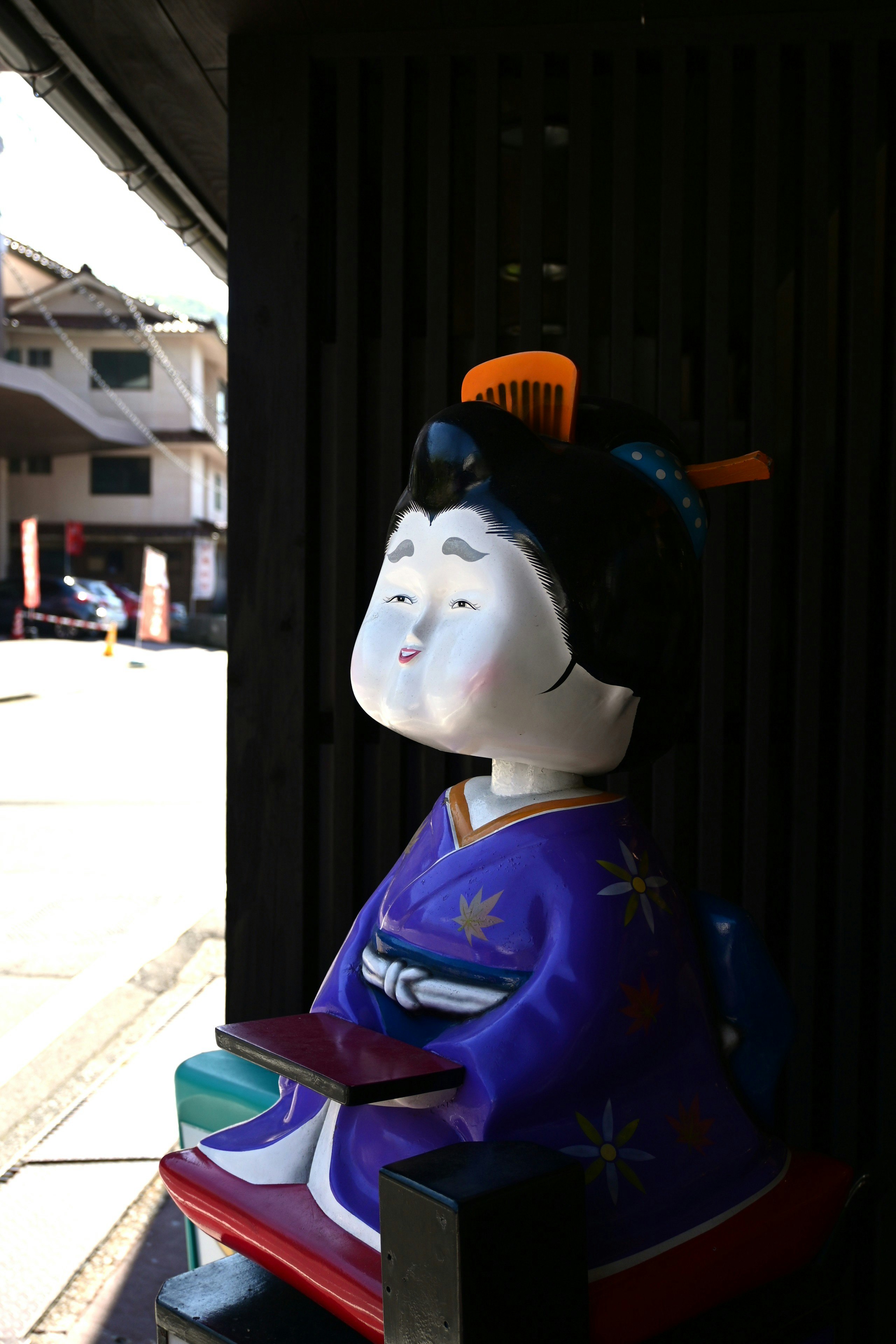 京都店铺檐下陈列的“御多福/おたべ”人偶