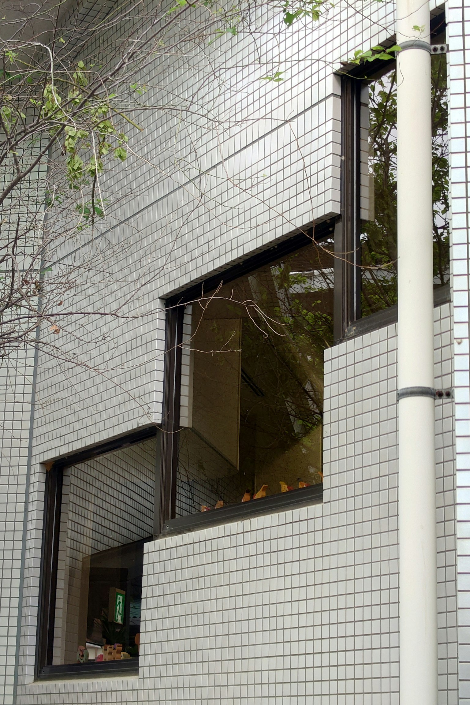 Modern building exterior with uniquely shaped windows