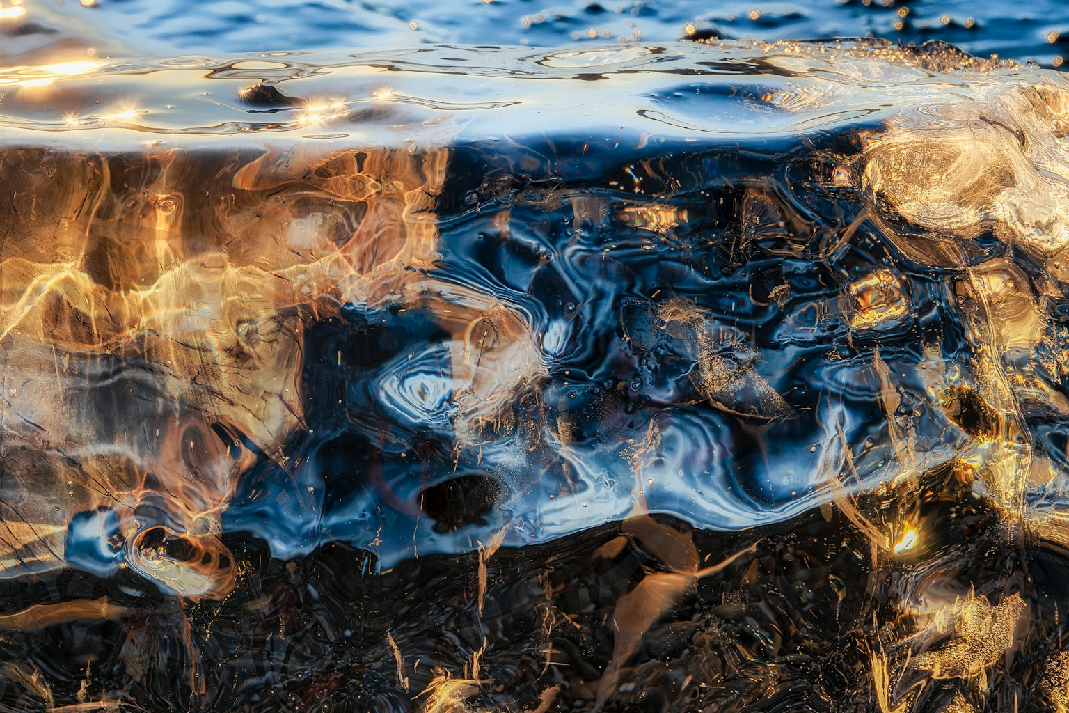 Abstract patterns and colors beneath the water surface