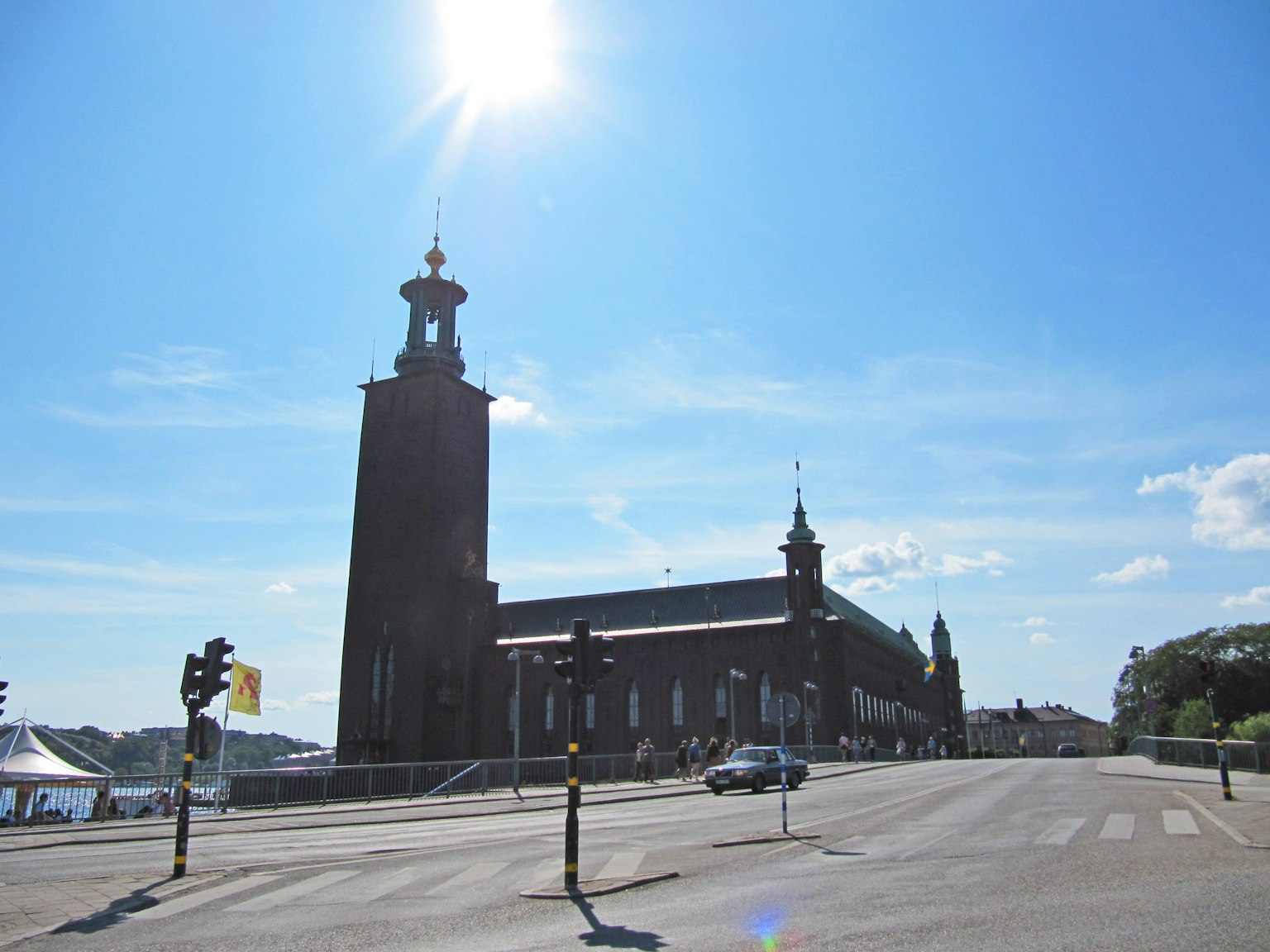 Stockholm City Hall exterior bright blue sky and shining sun