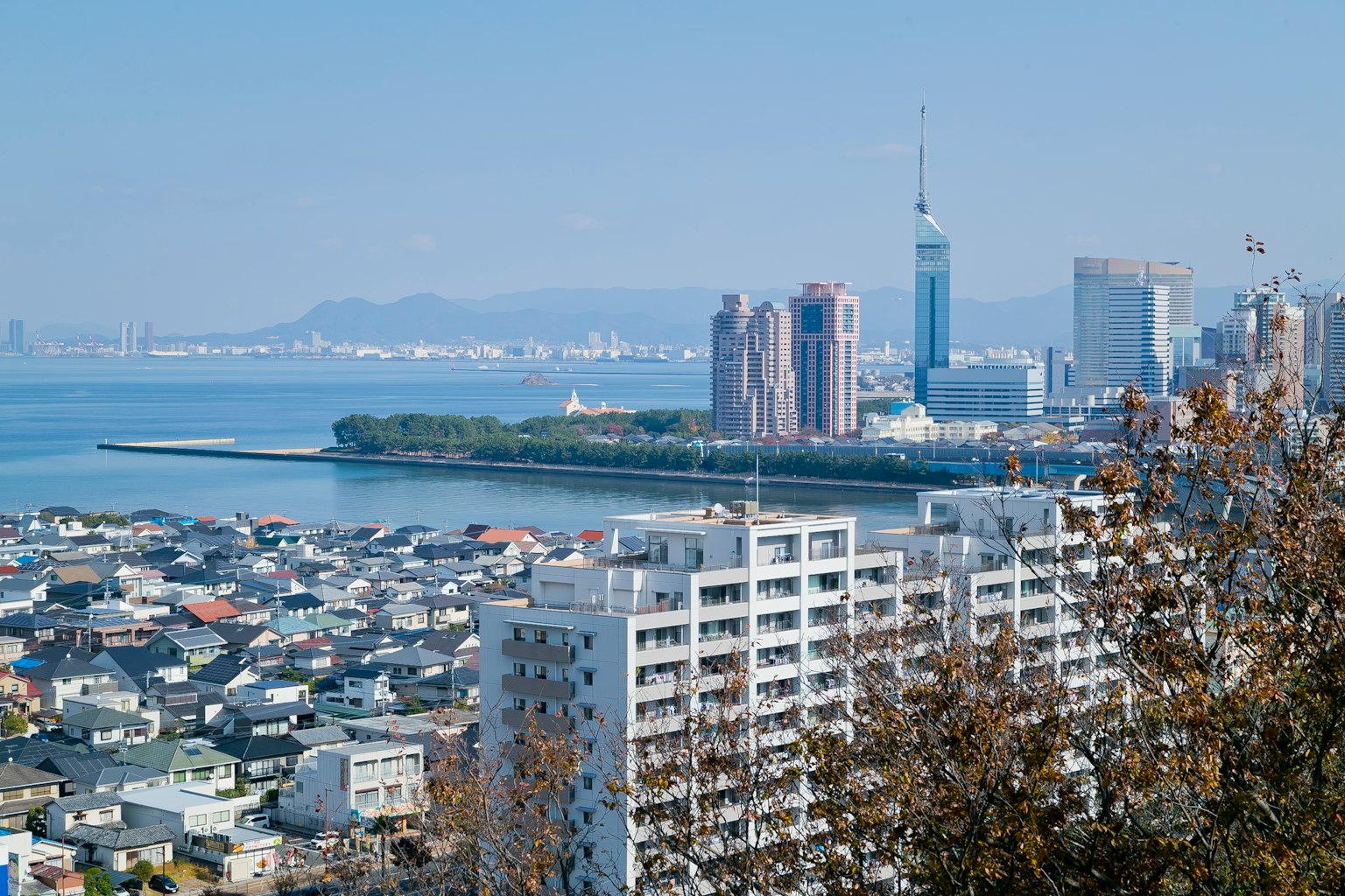 Cityscape of Fukuoka with Hakata Bay in the background