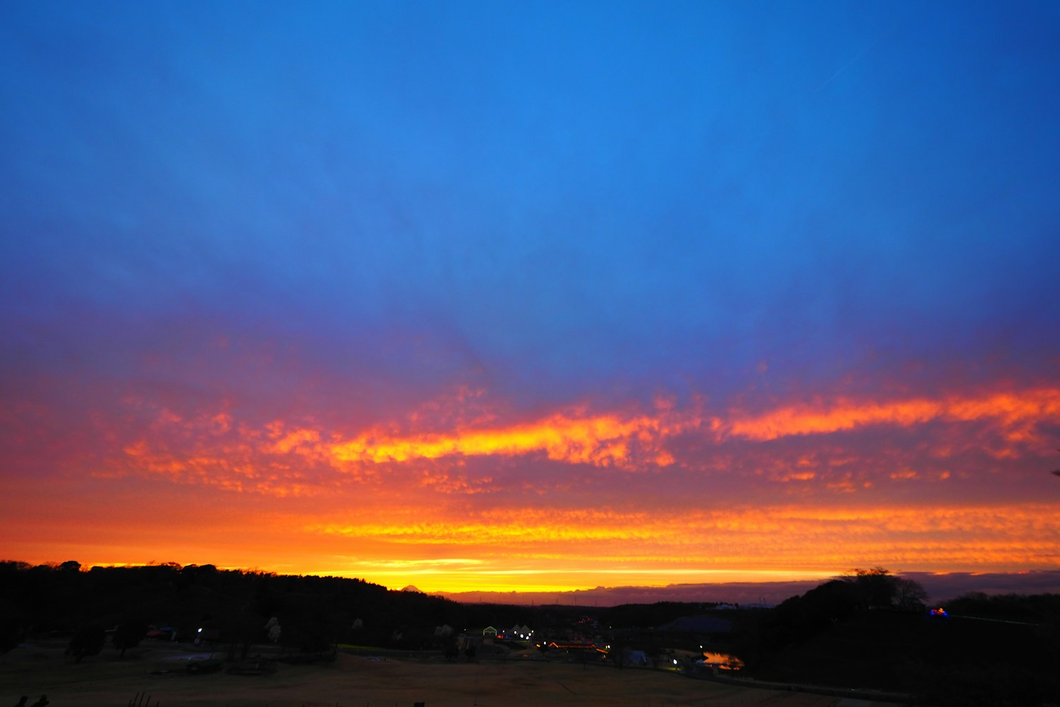 Beautiful sunset sky with orange clouds