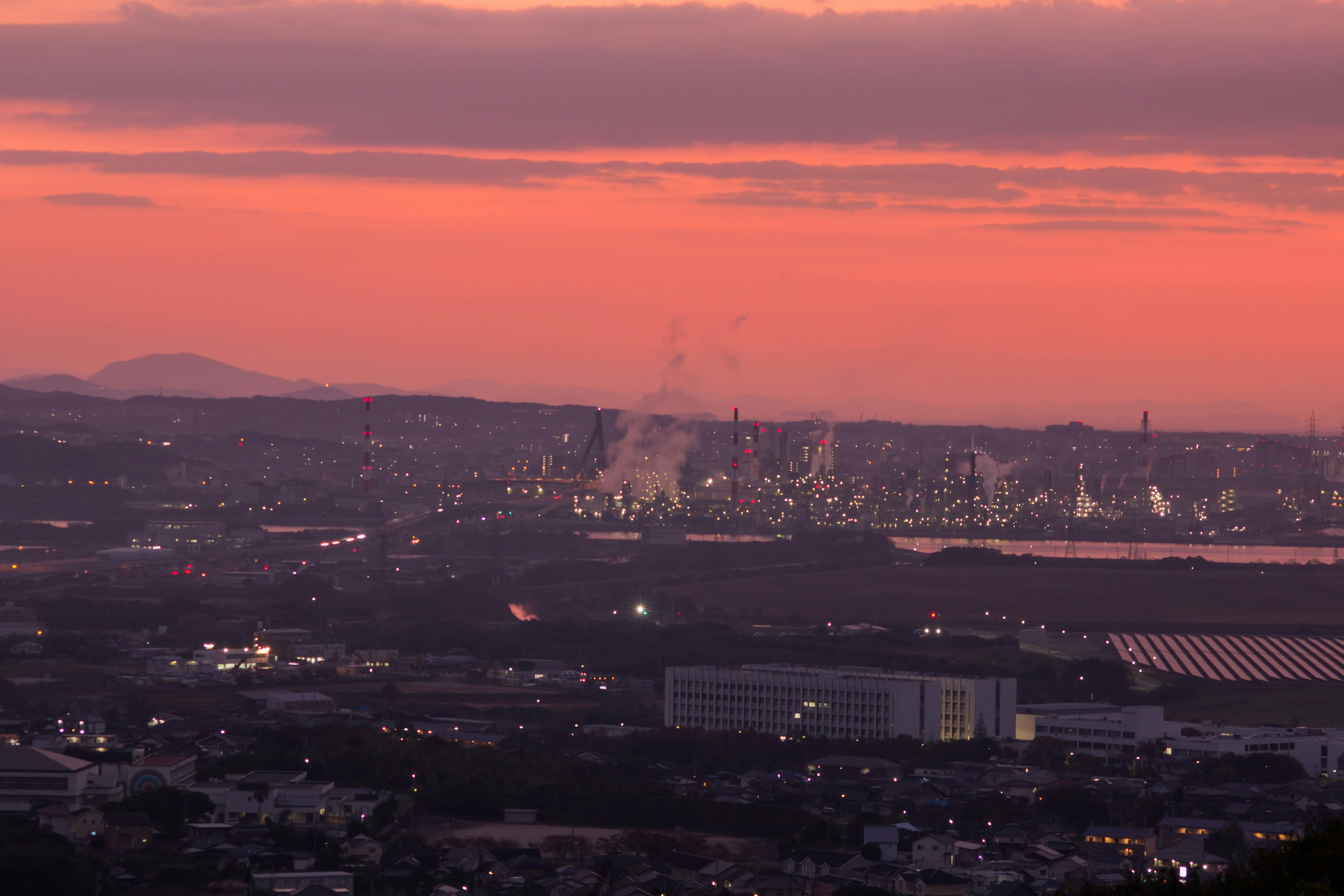 sunset cityscape with a harbor night view