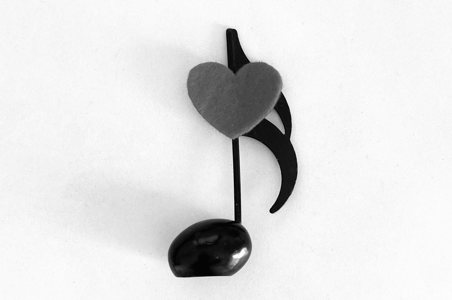 Obra de arte con diseño de corazón y nota musical