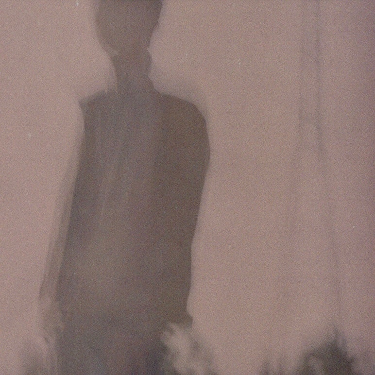 person silhouette in the fog