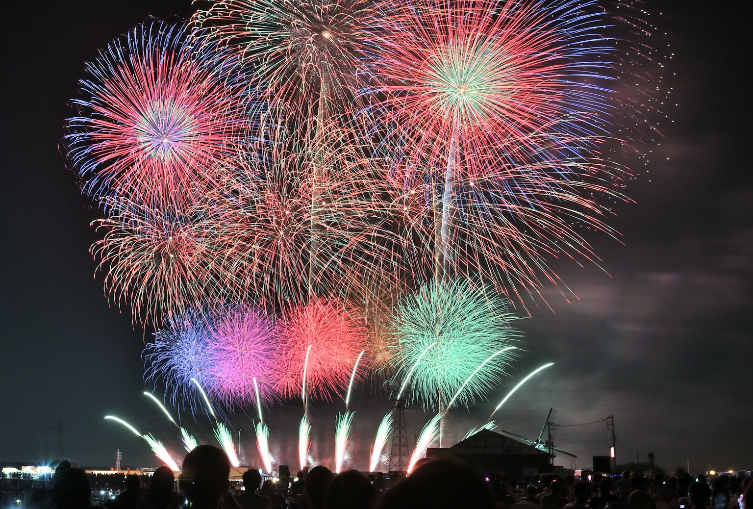 Colorful fireworks bursting in the night sky creating a vibrant display