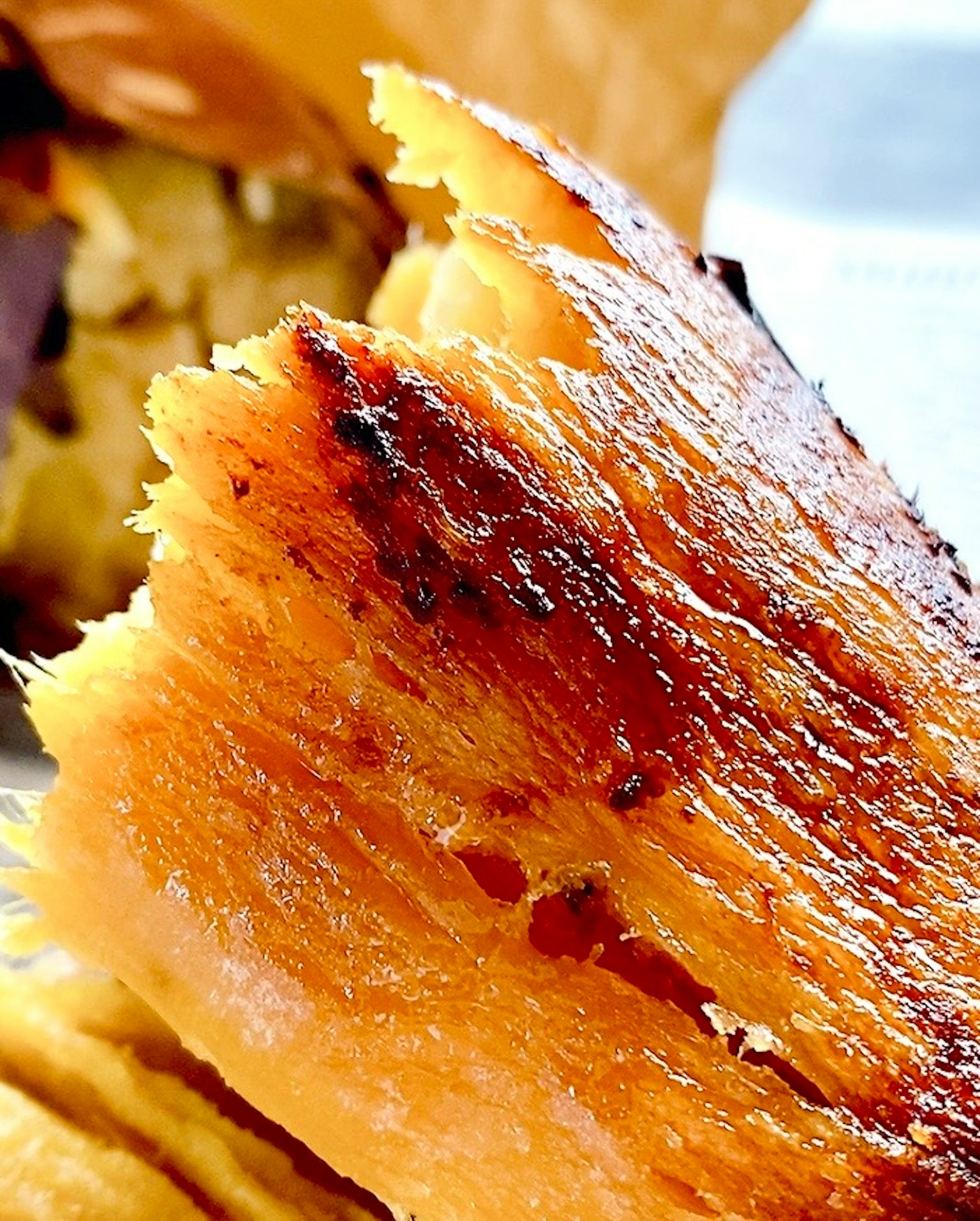 Close-up of toasted bread with a crisp golden crust and texture