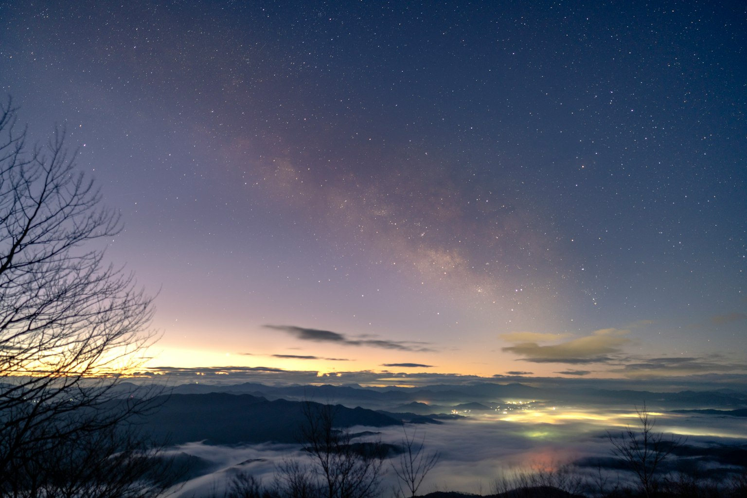 Stunning landscape featuring the Milky Way and a sea of clouds at night