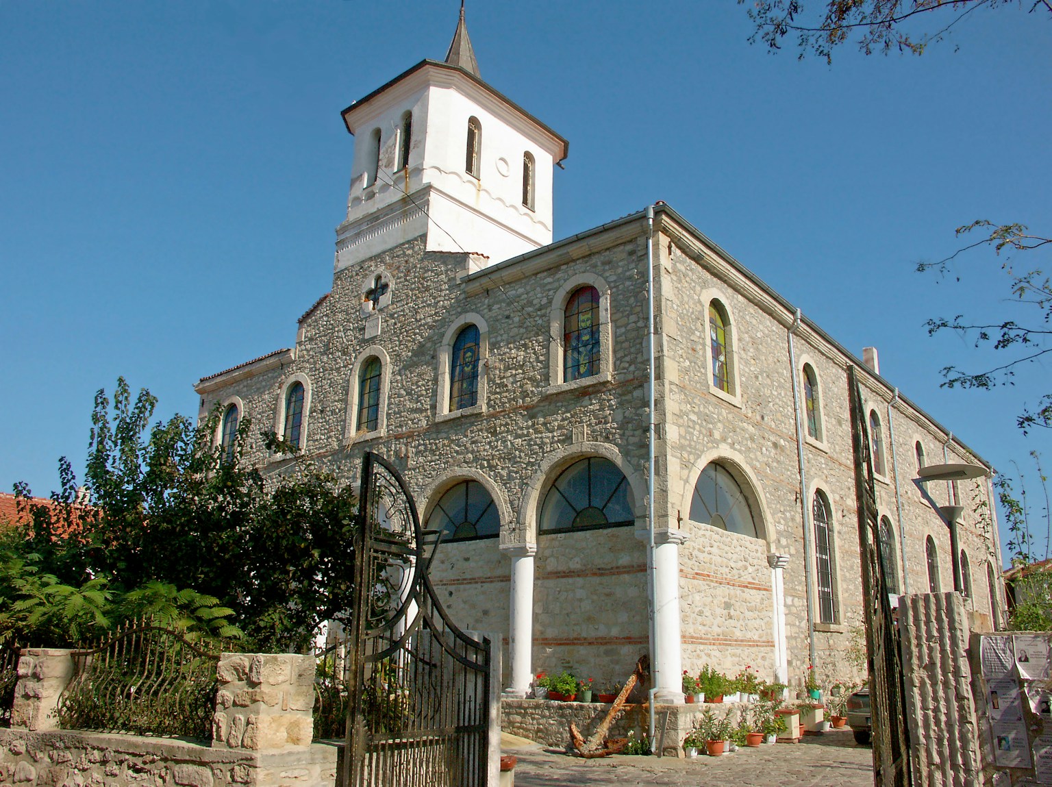 Stone church exterior with blue sky background