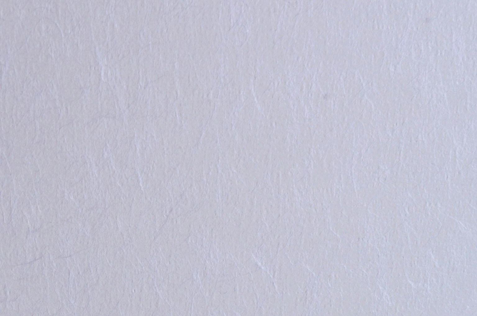 Oberfläche aus hellgrauem strukturiertem Papier