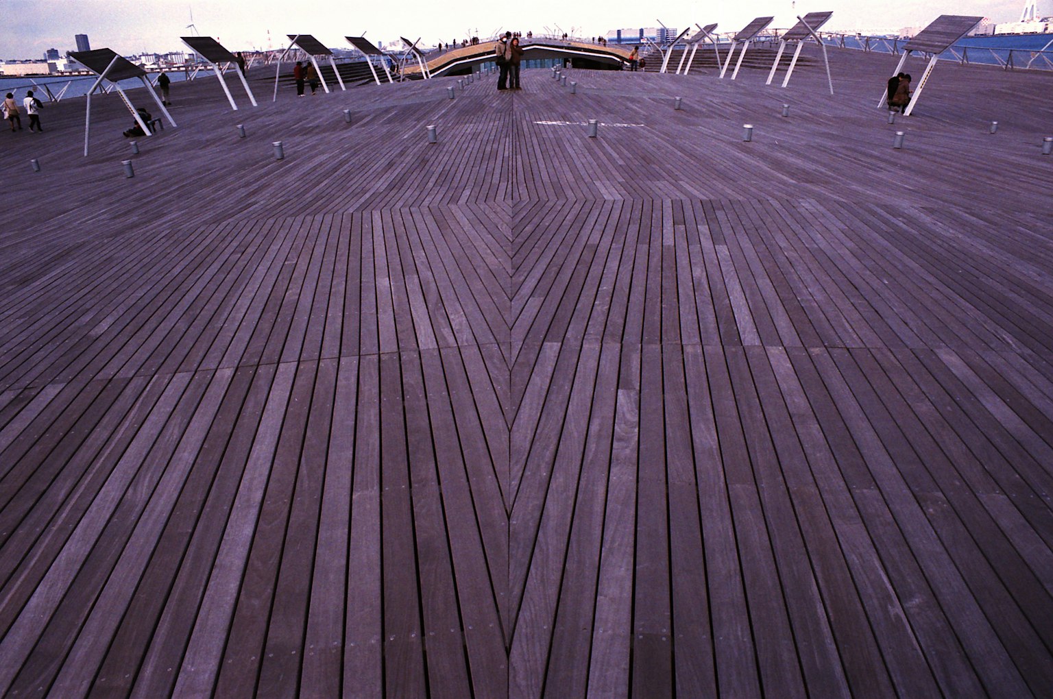 Wooden deck pattern with a person standing